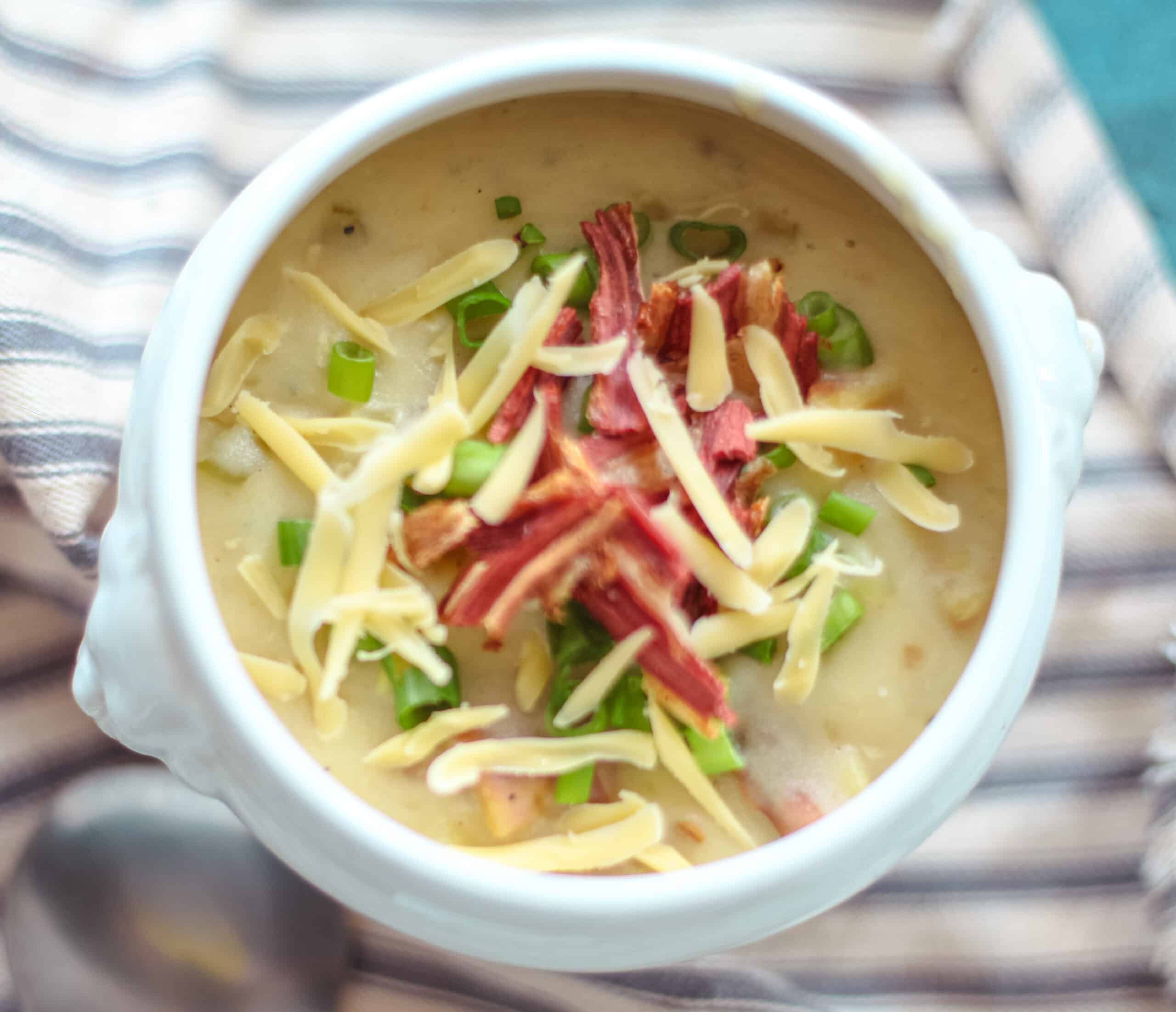 Baked potato soup in a bowl.