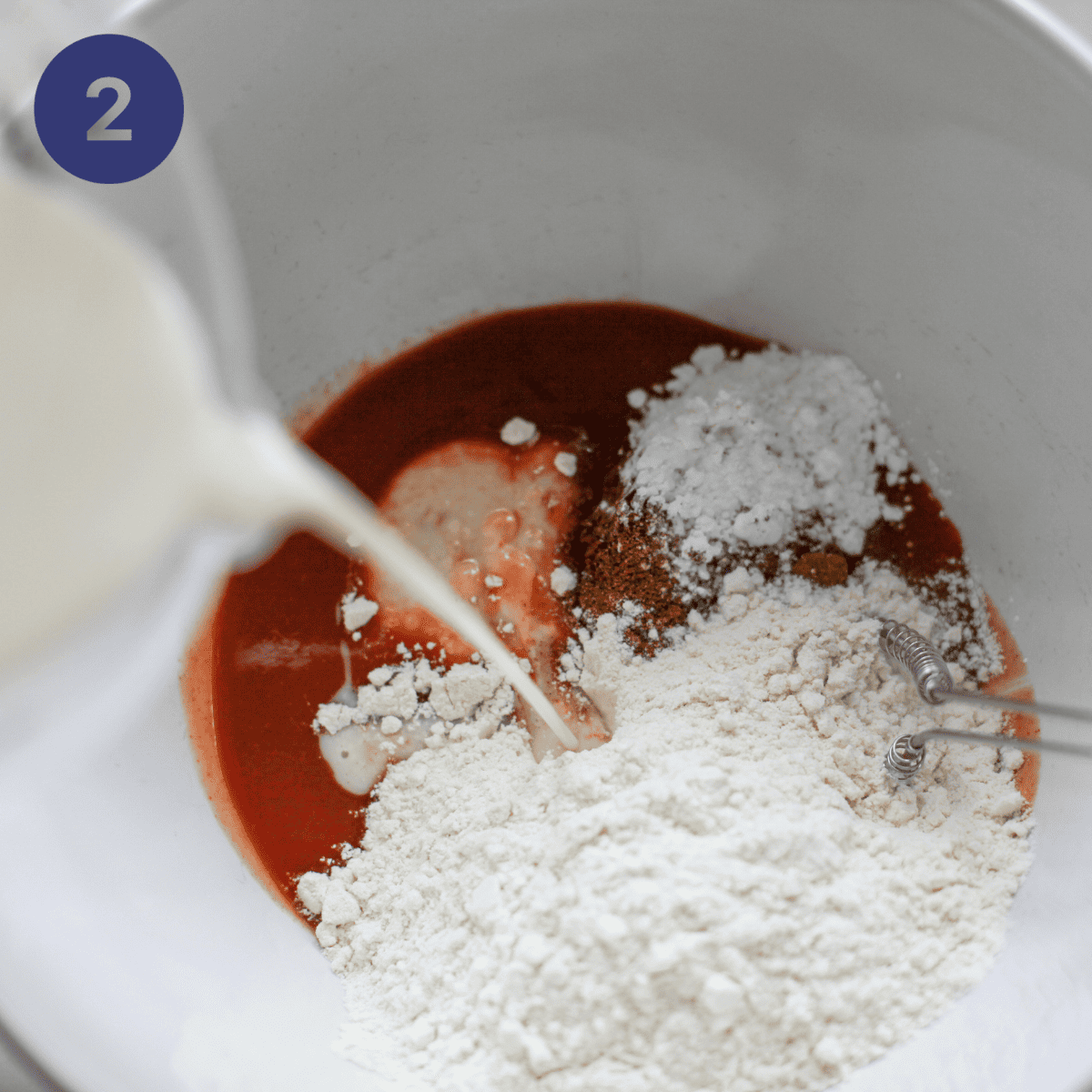 Mixing up batter for buffalo wings.