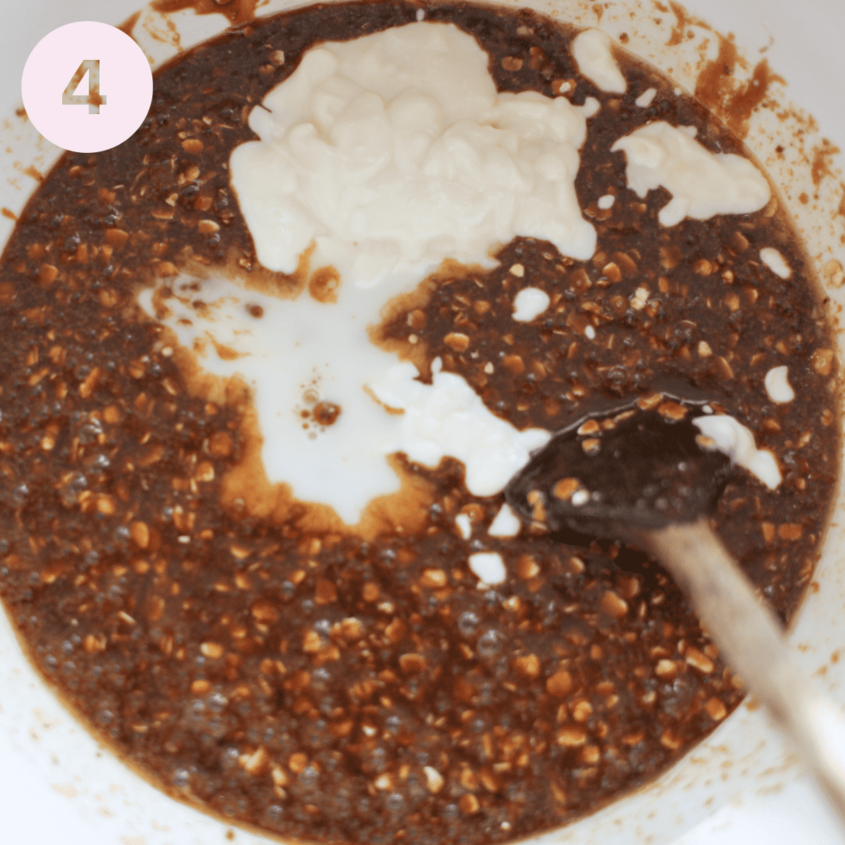 Adding yogurt and milk to the parkin batter.