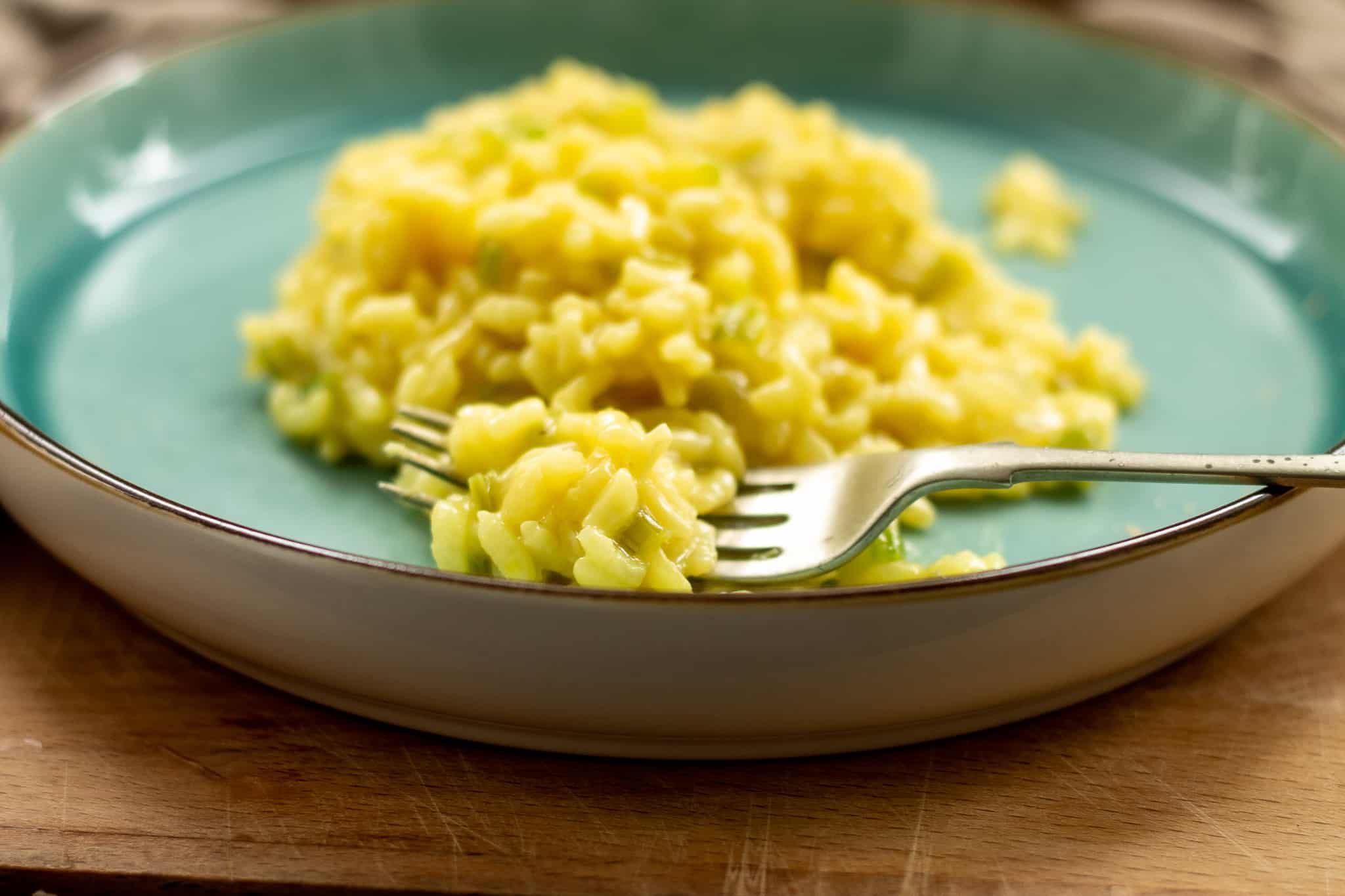 A plate with a serving of risotto.