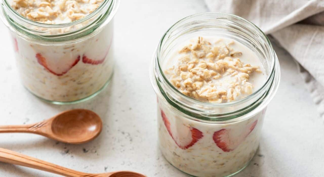 A jar of oats with strawberries