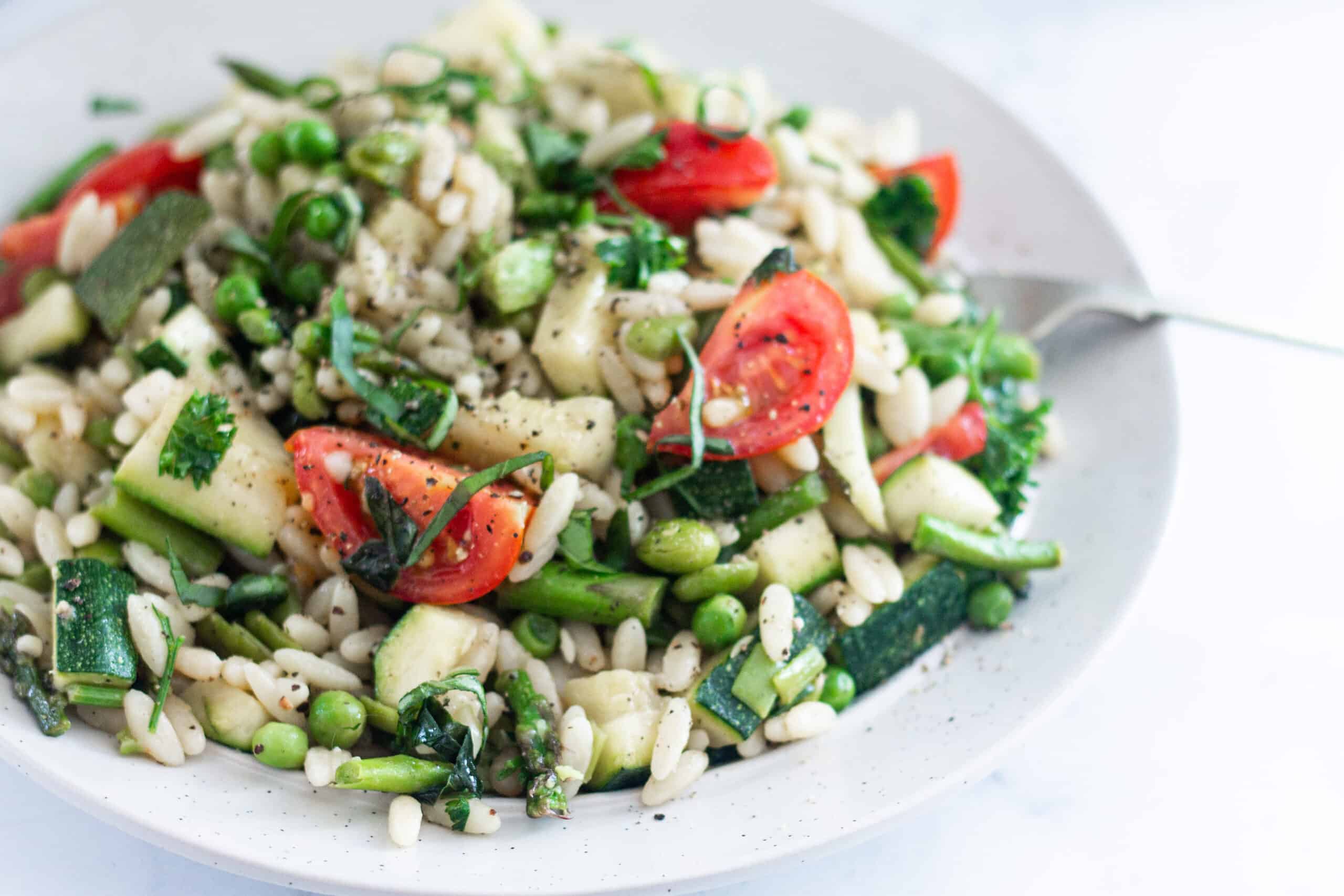 Vegan Pasta Primavera in a large white bowl