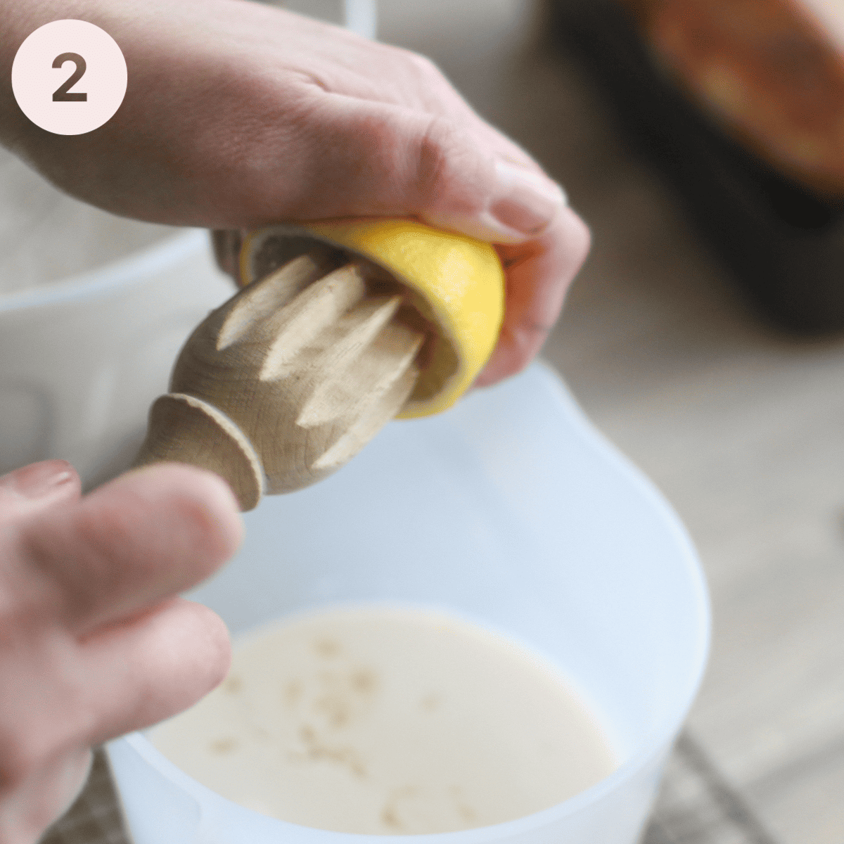 Adding lemon juice to milk to sour it.