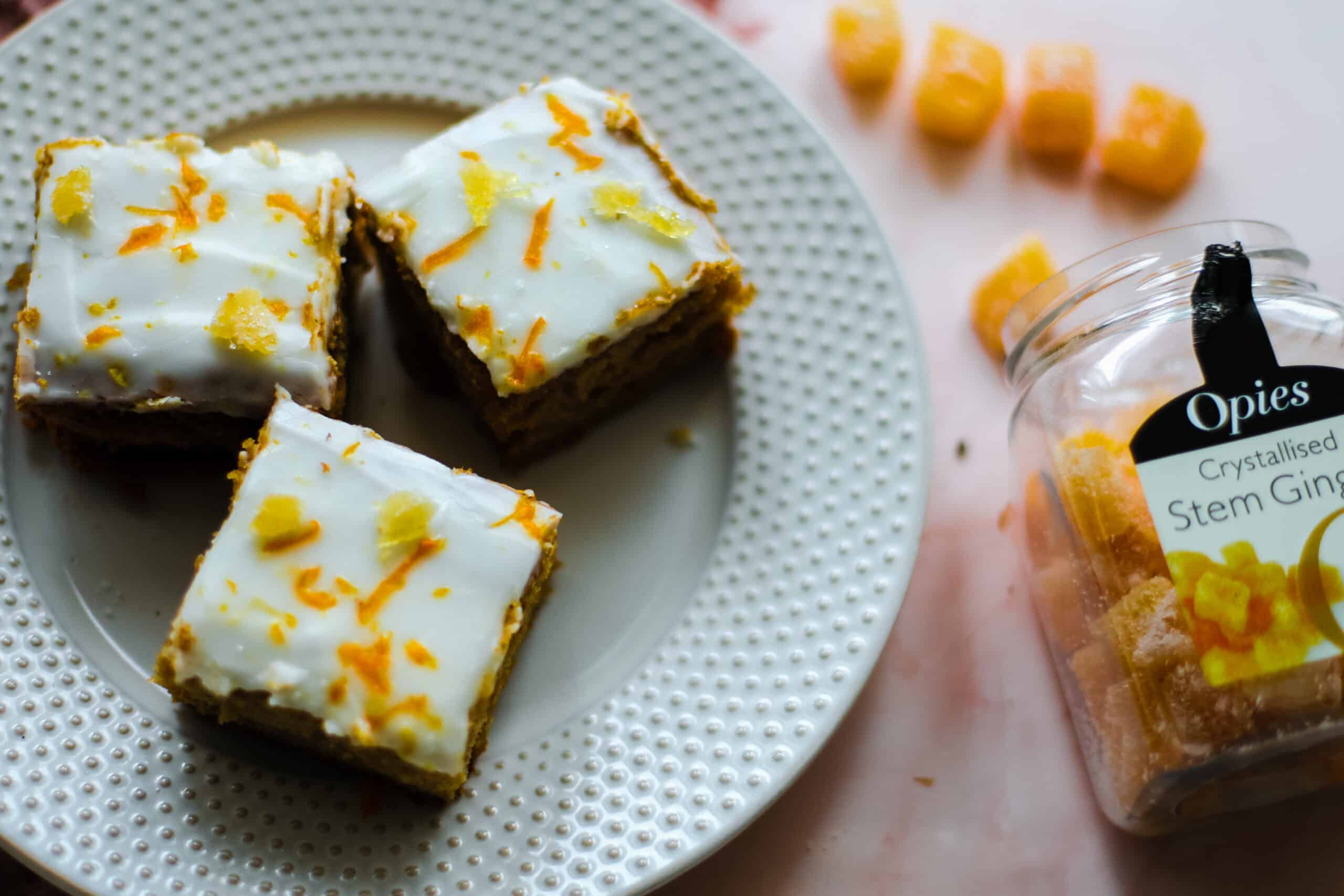 A plate of squares of gingerrbread.