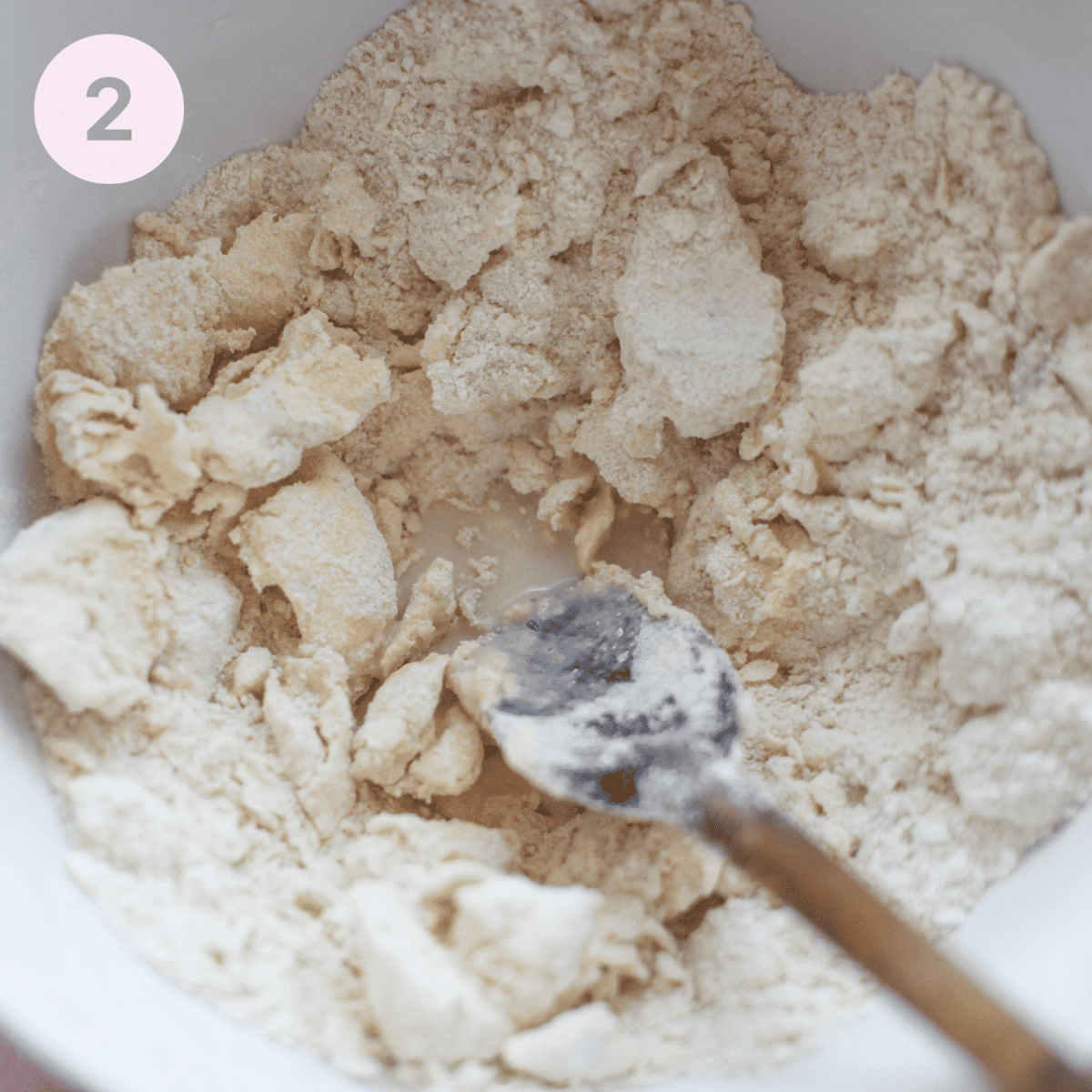 Mixing shortbread ingredients in a large mixing bowl.
