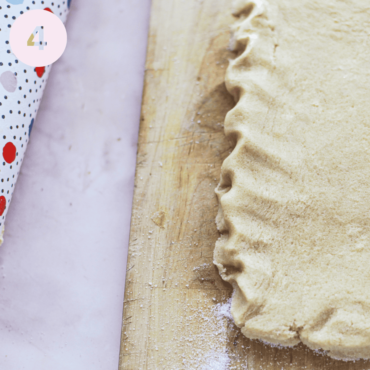 Rolling out shortbread dough.