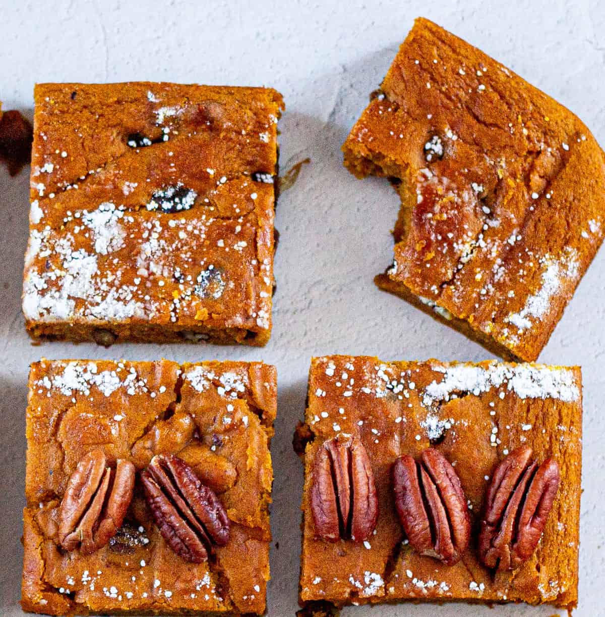 Four slices of pumpkin cake.