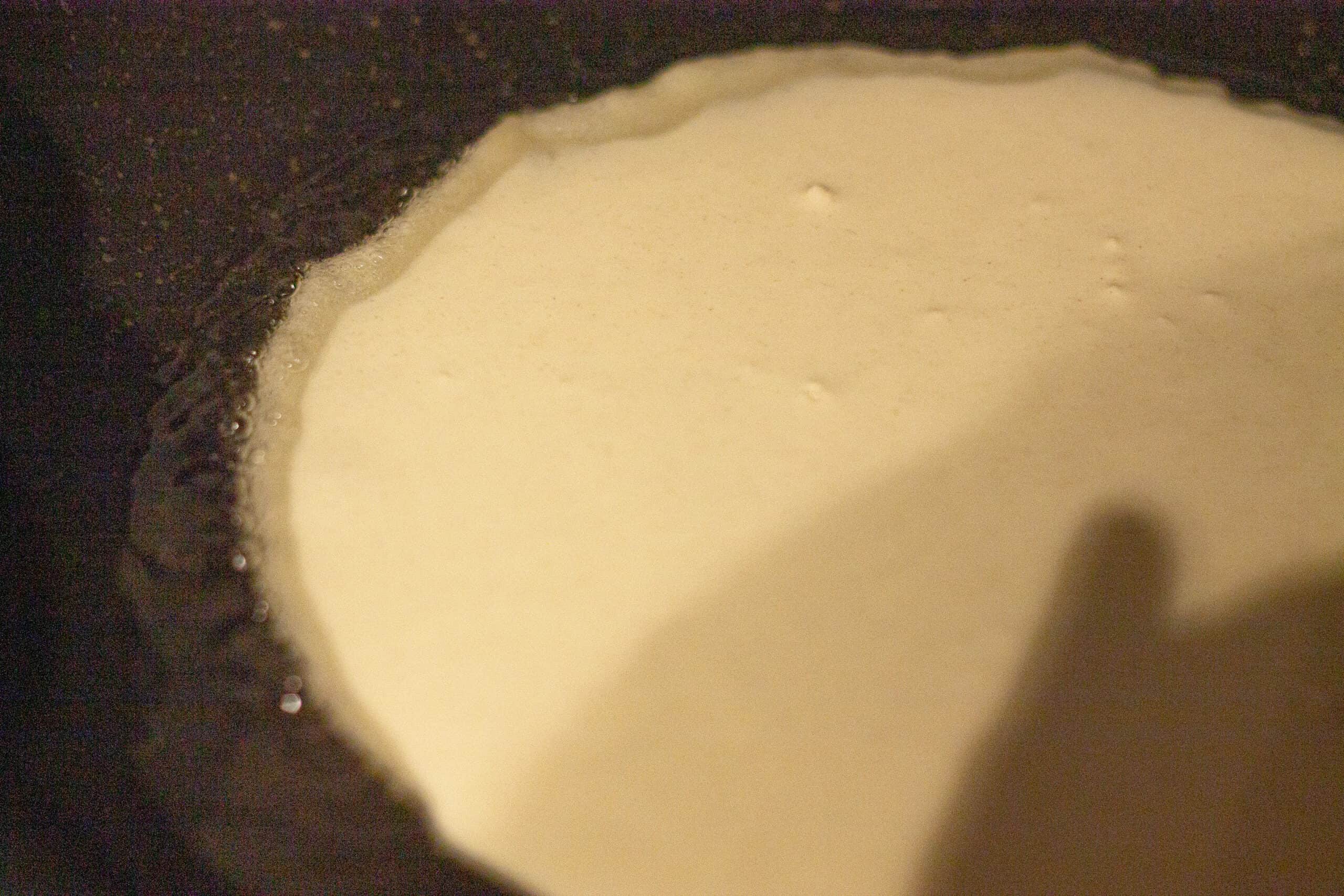 Swirl pancake batter around the pan