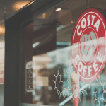 A Costa Coffee Sign in a coffee shop