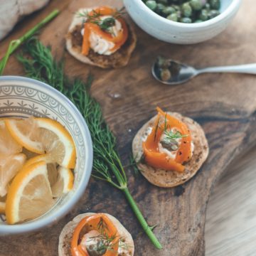 A display of vegan smoked salmon and blinis