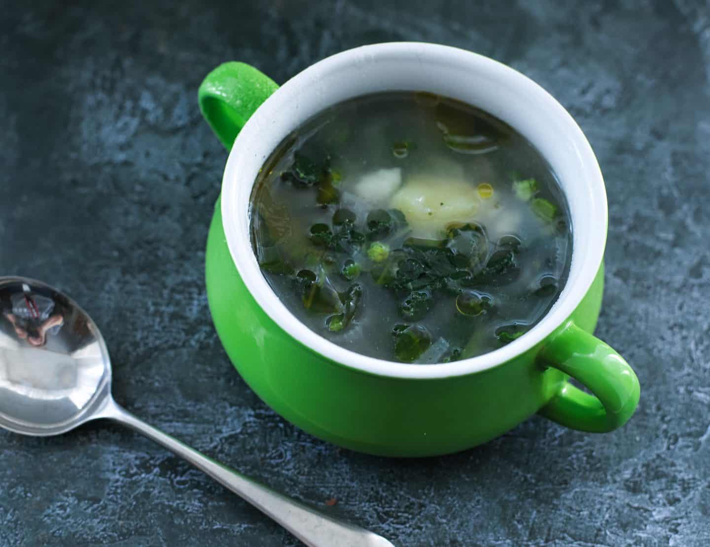 A bowl of caldo verde soup
