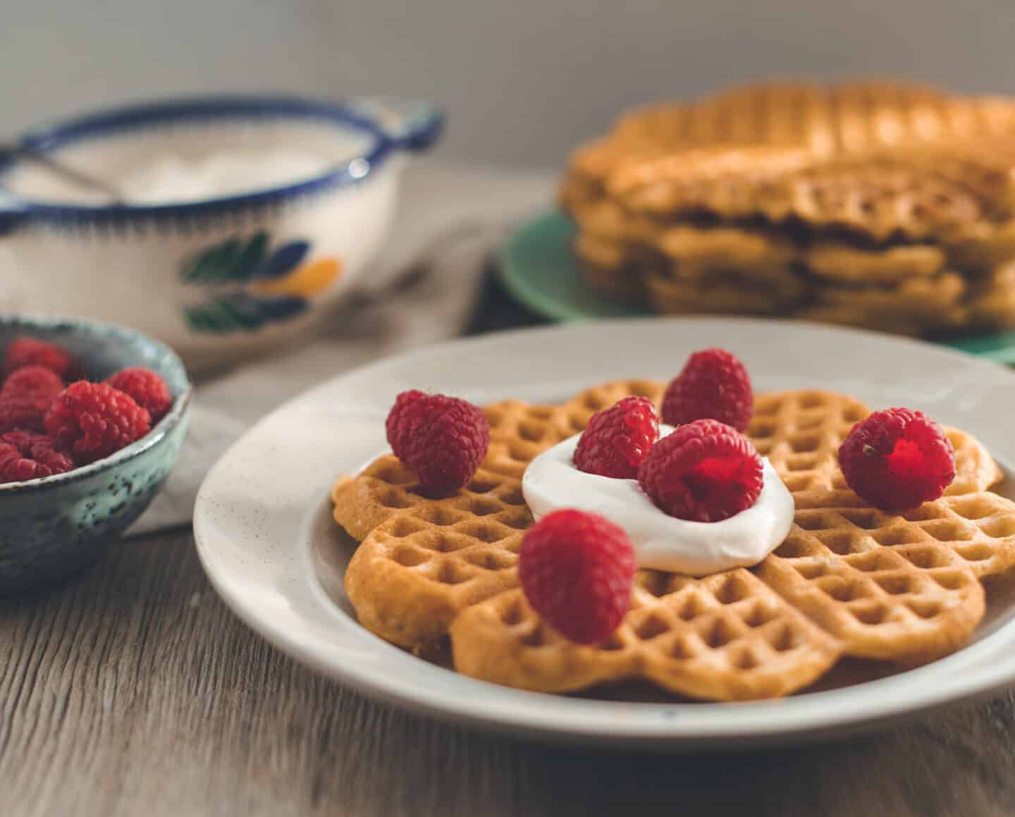 A stack of vegan cornmeal waffles