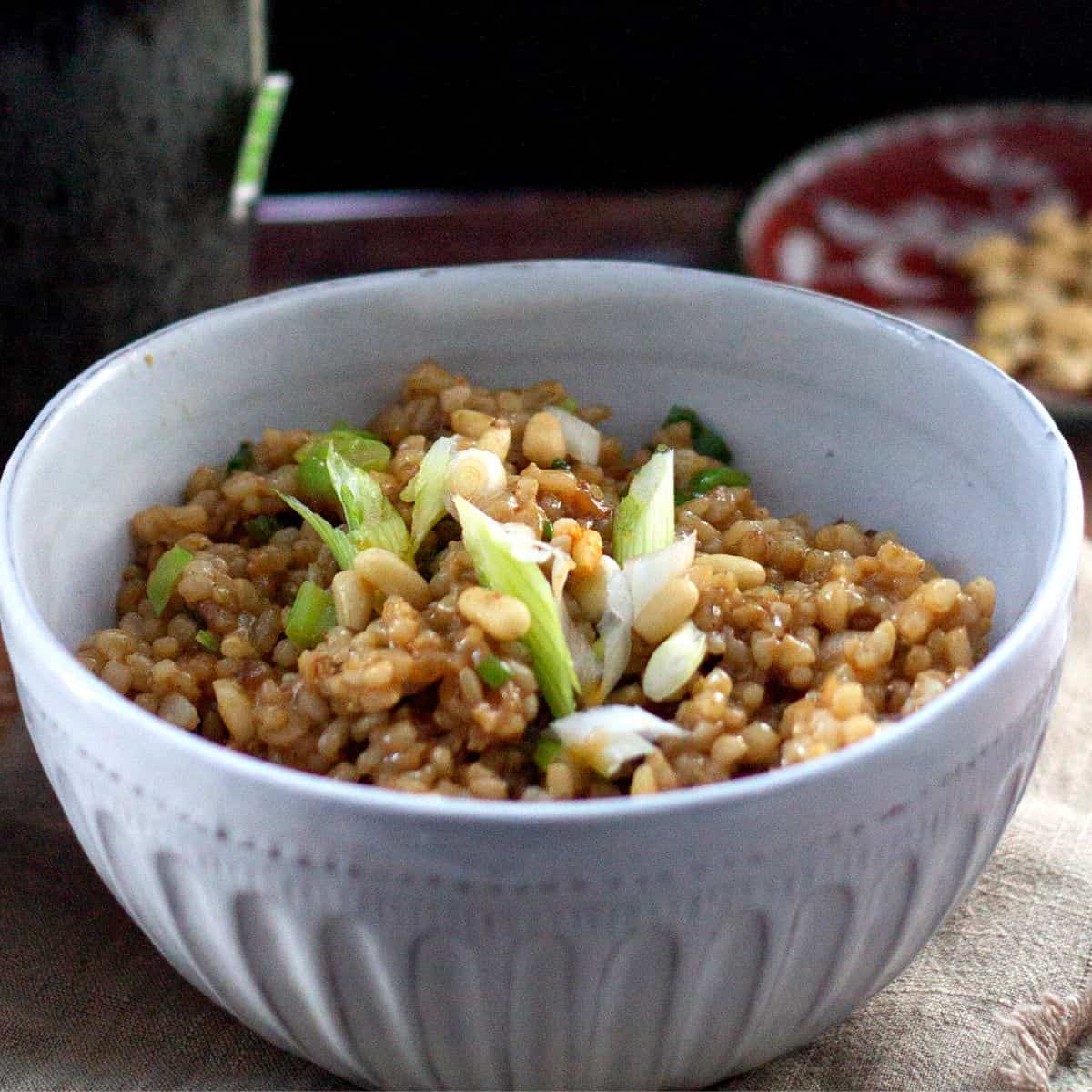 Matsunoma brown rice in a bowl with spring onions