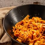 Crispy Chili Oil Noodles in a black bowl
