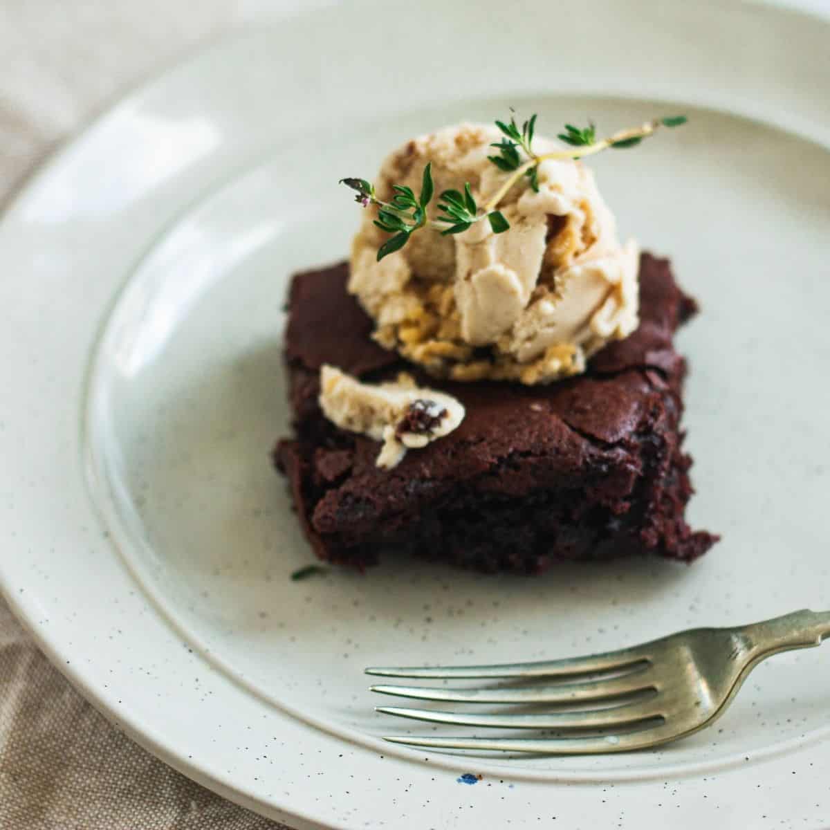 A vegan brownie with ice cream