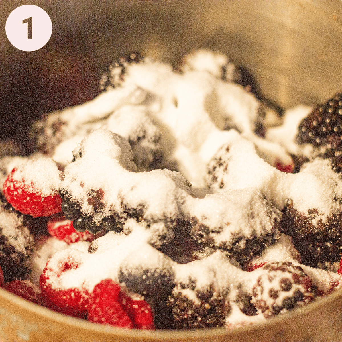 Stewing summer berries with some sugar.