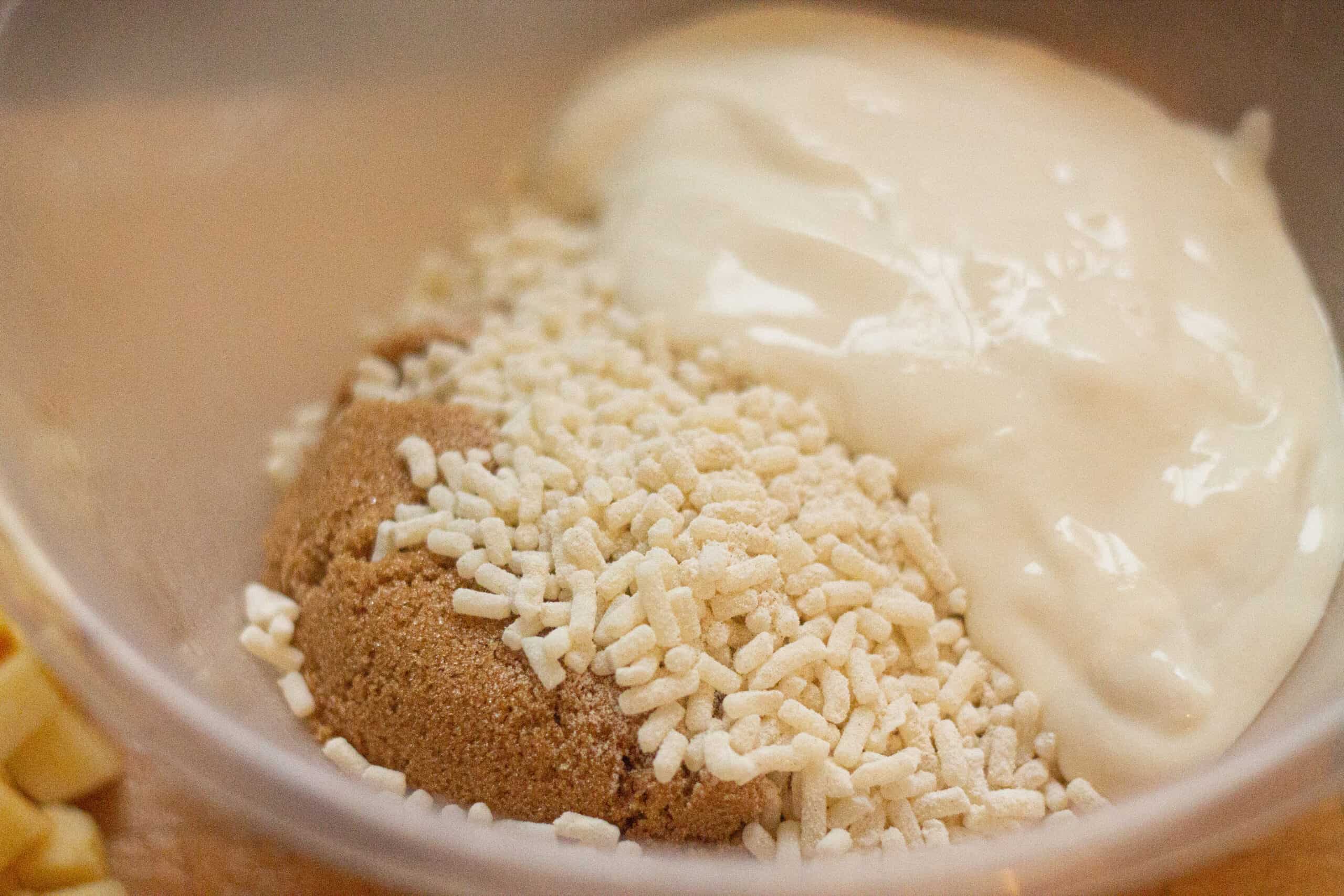 Mixing suet with yogurt and sugar for christmas pudding