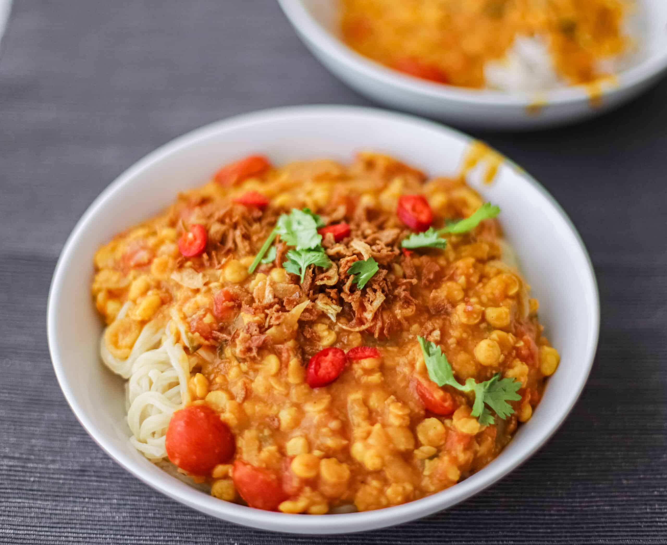 A bowl of spicy lentils and noodles