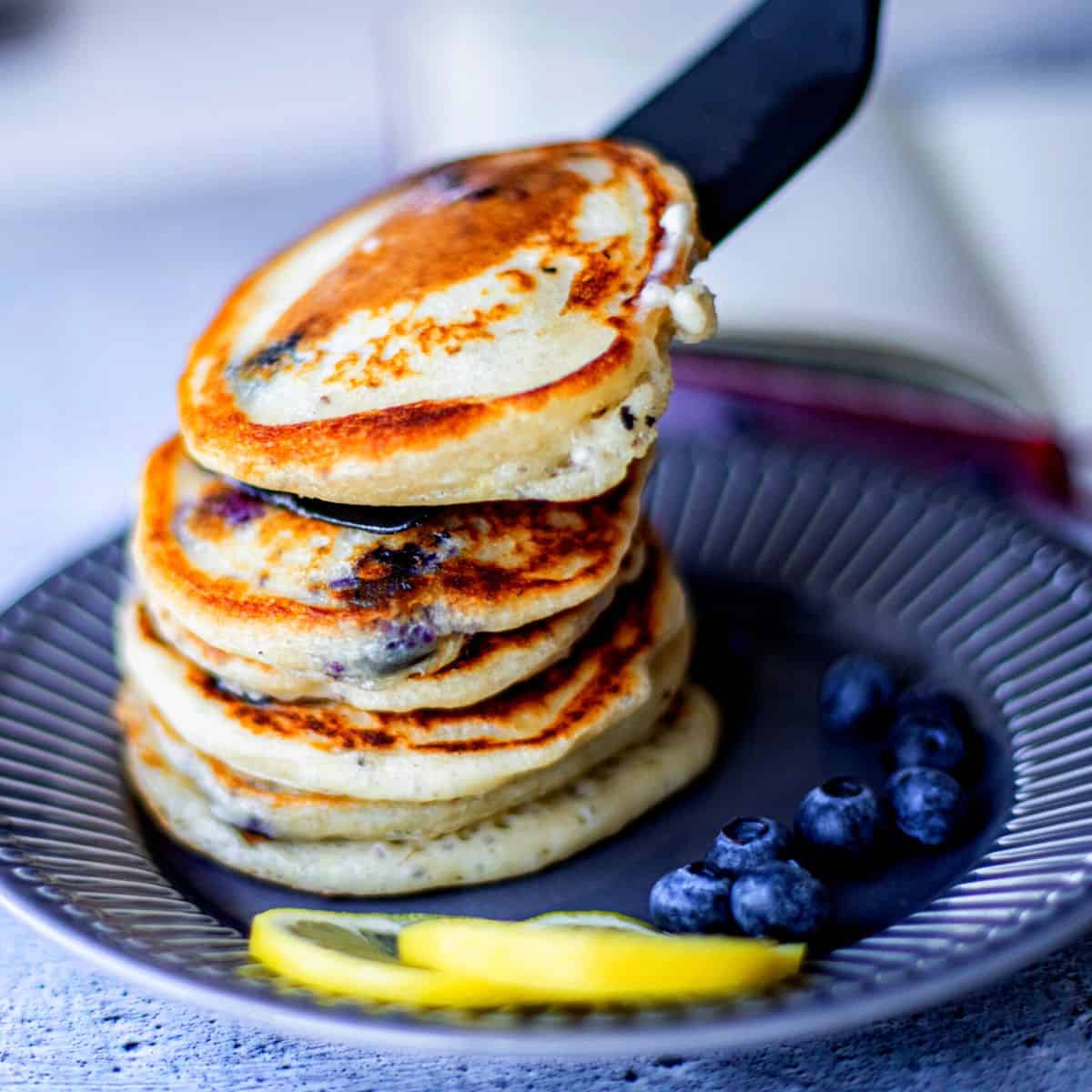 A stack of blueberry pancakes