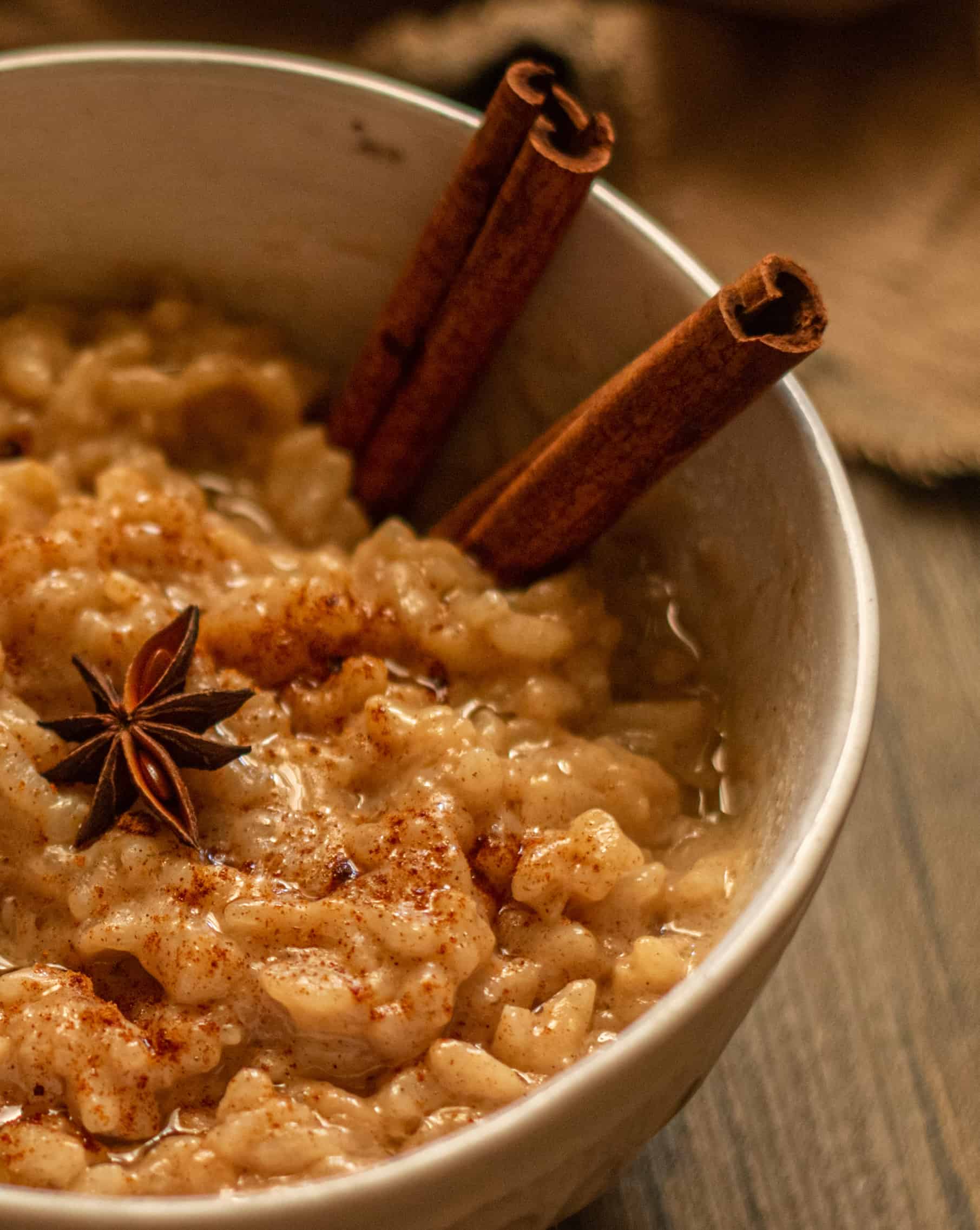 Arroz con Leche with cinnamon sticks 