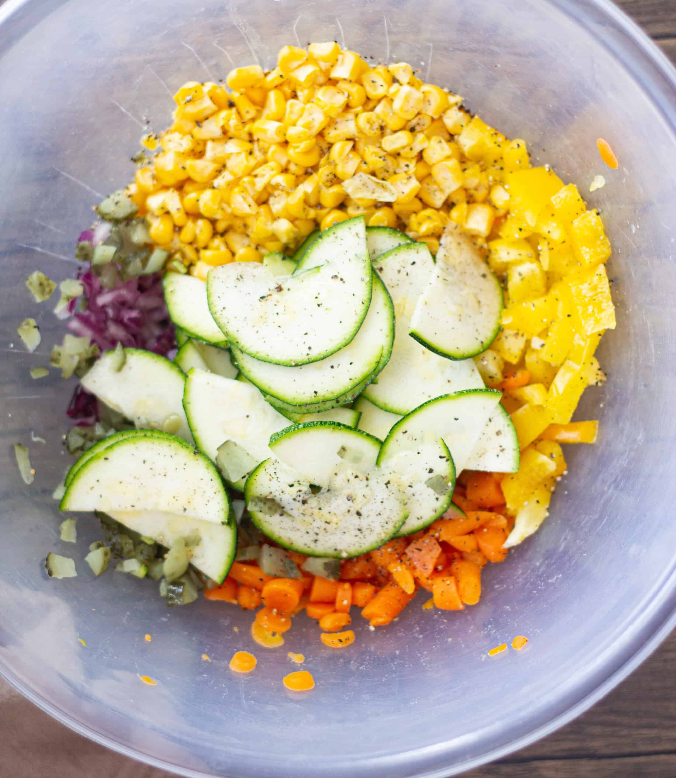 Prepped Veggies in a bowl for pasta salad
