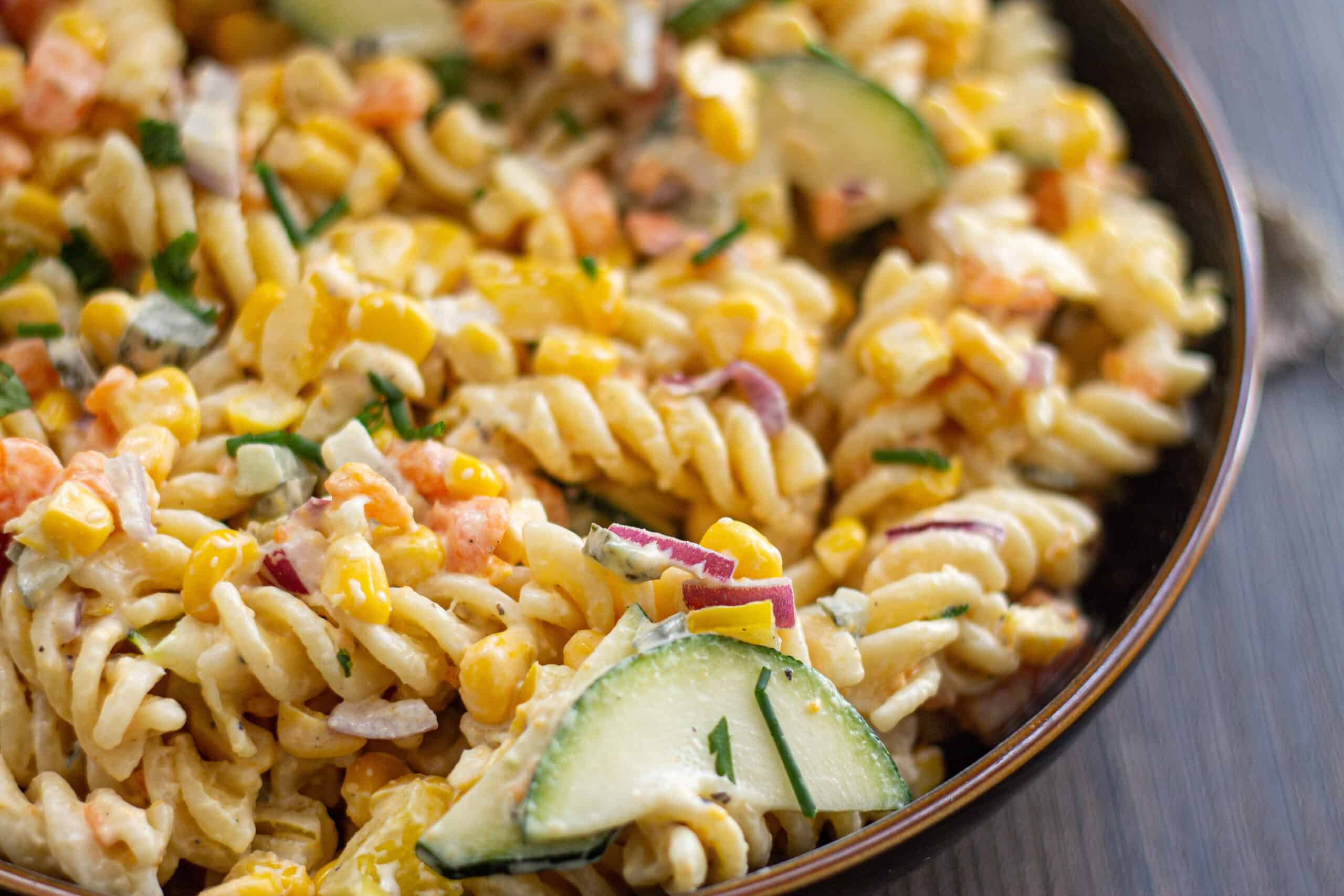 A close of a creamy vegan pasta salad