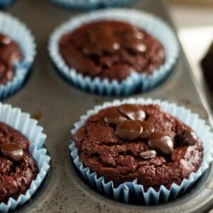 A baking tray with beetroot muffins