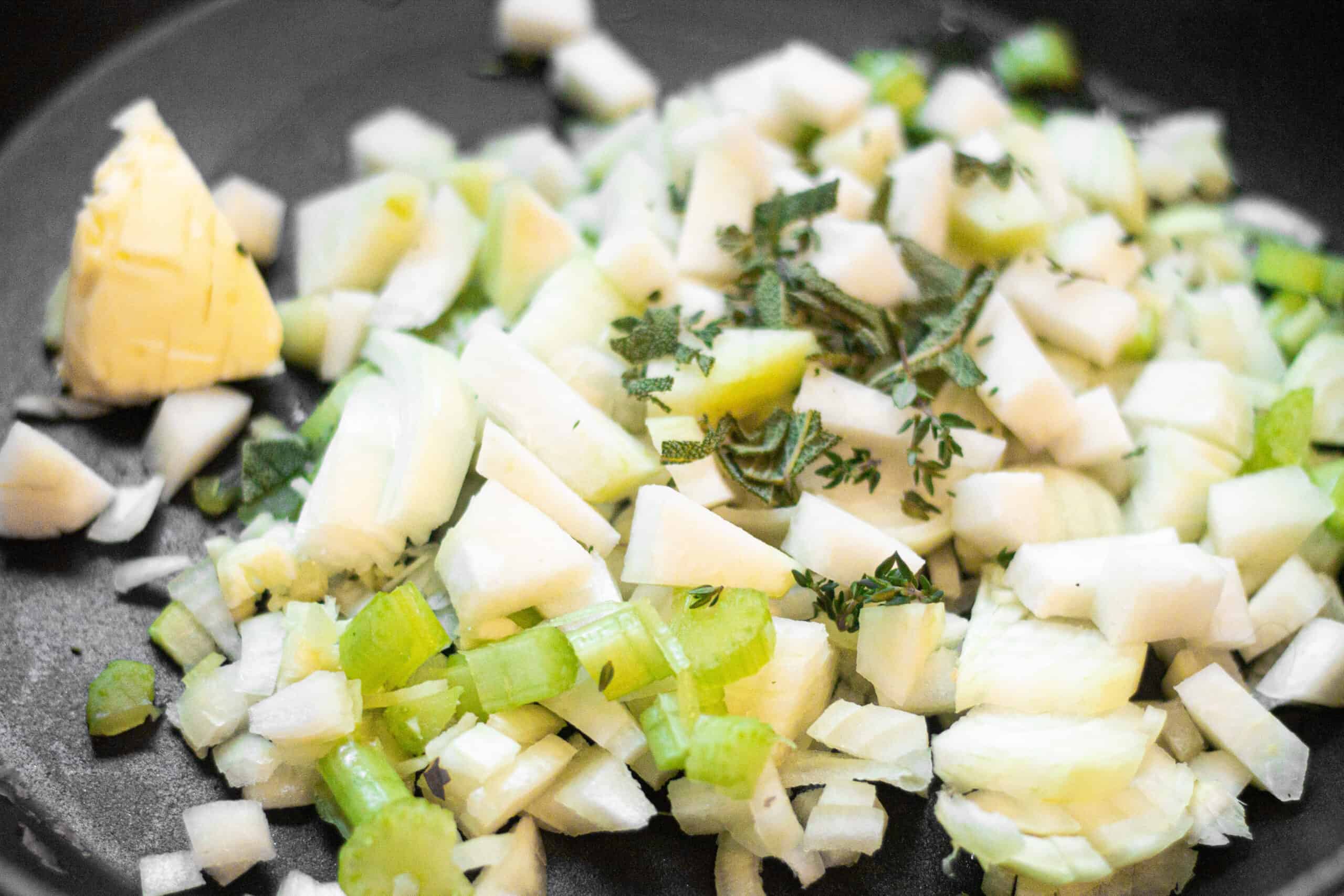 frying up onions, garlic and celery