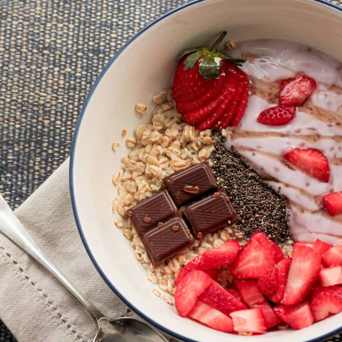 Bowl of oatmeal with strawberries