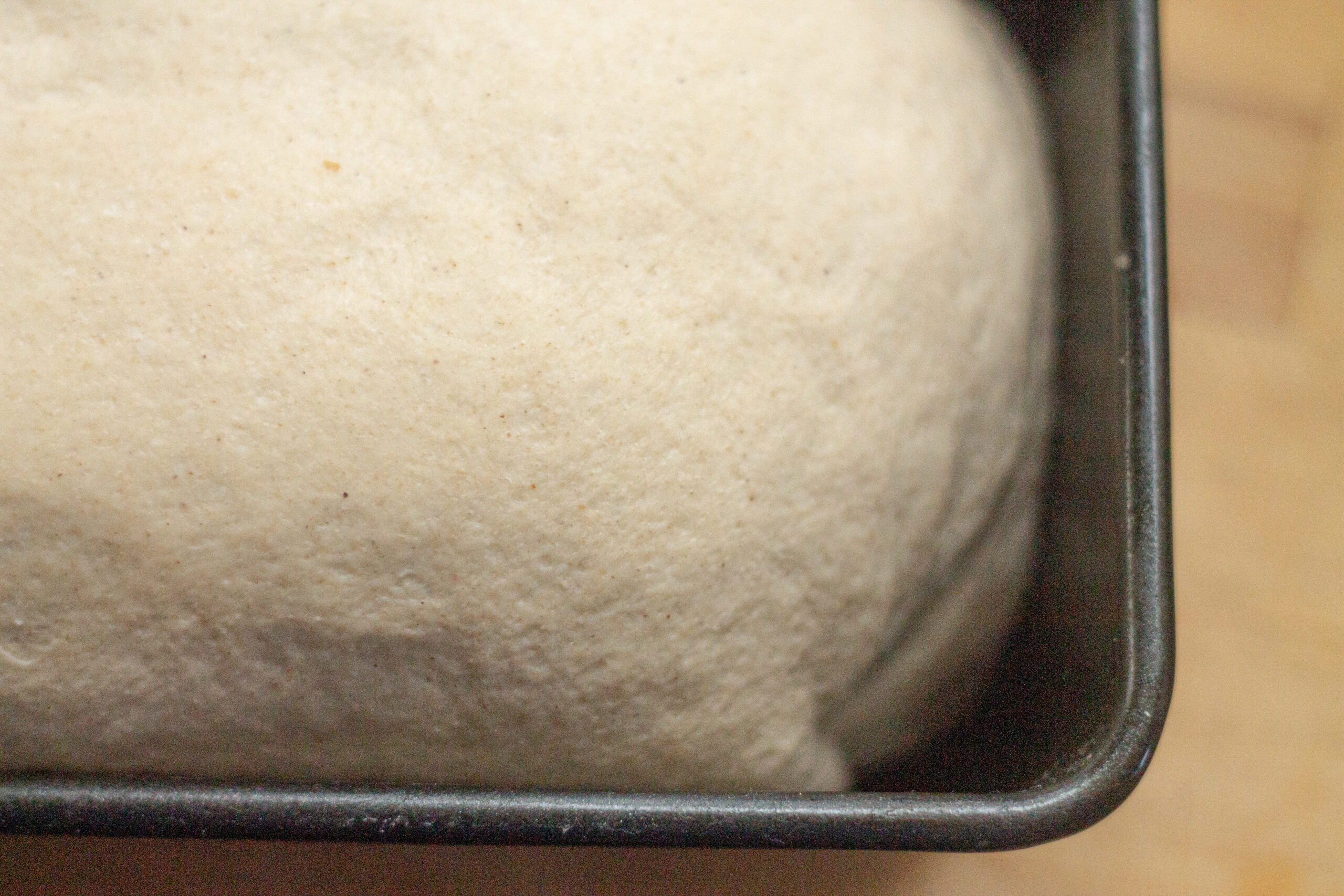 Shaping dough by tucking the edges under