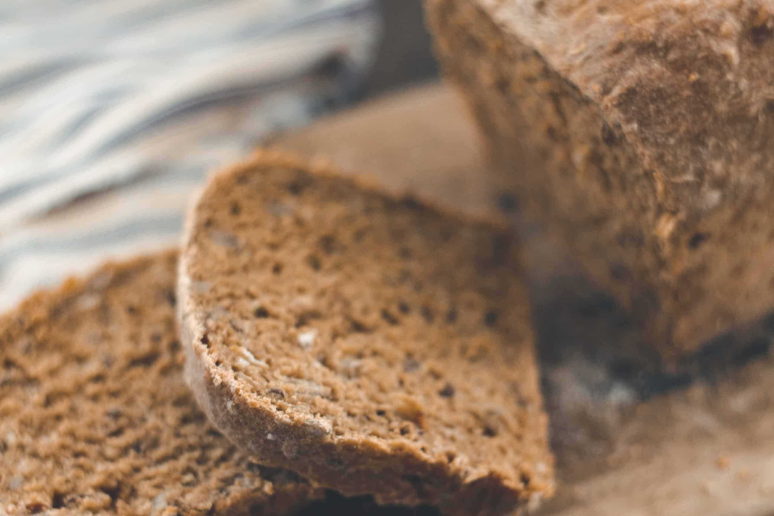 A sliced loaf of granary bread