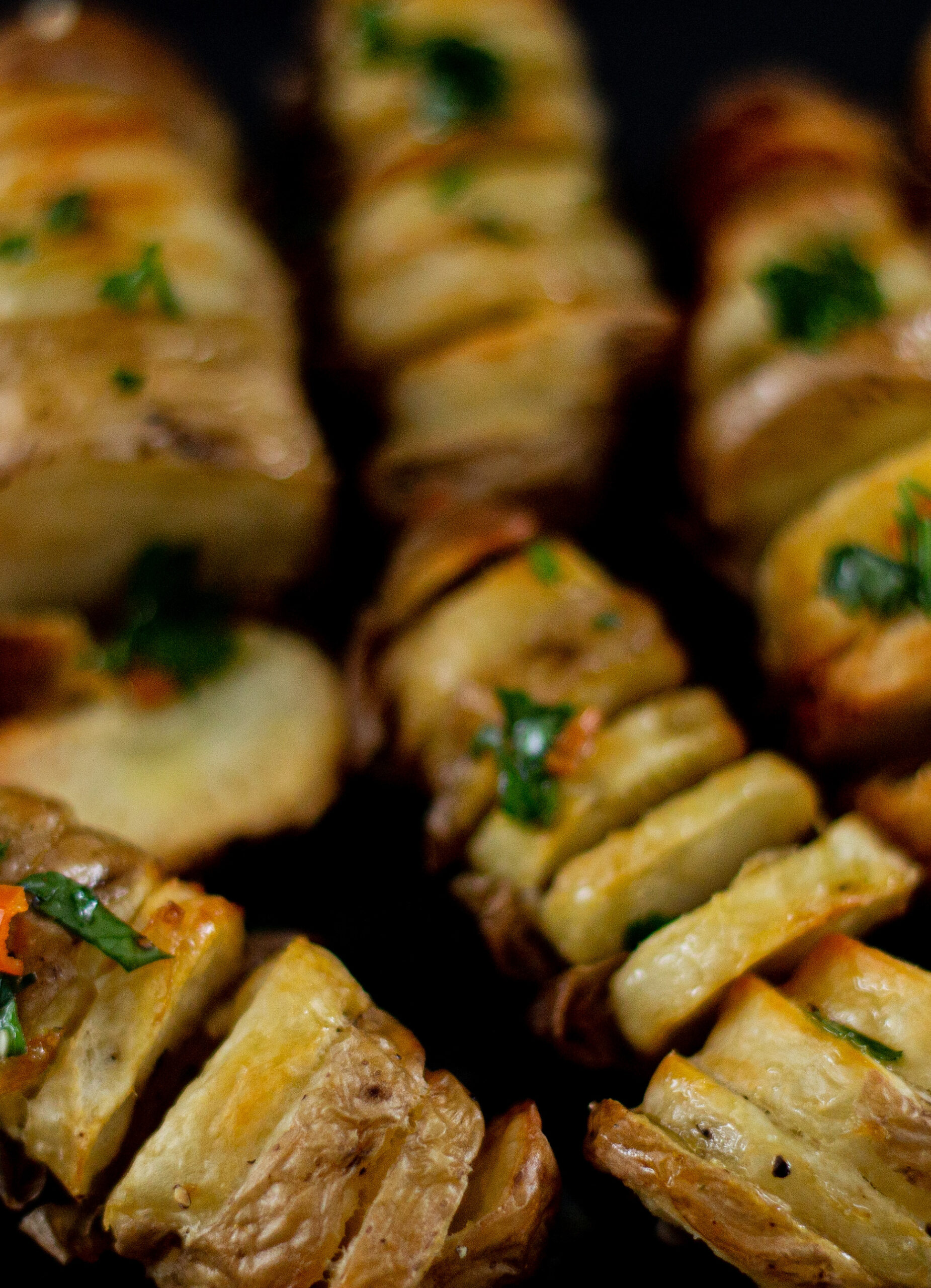 A tray of hasselback potatoes