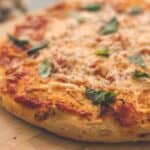 Pizza with basil