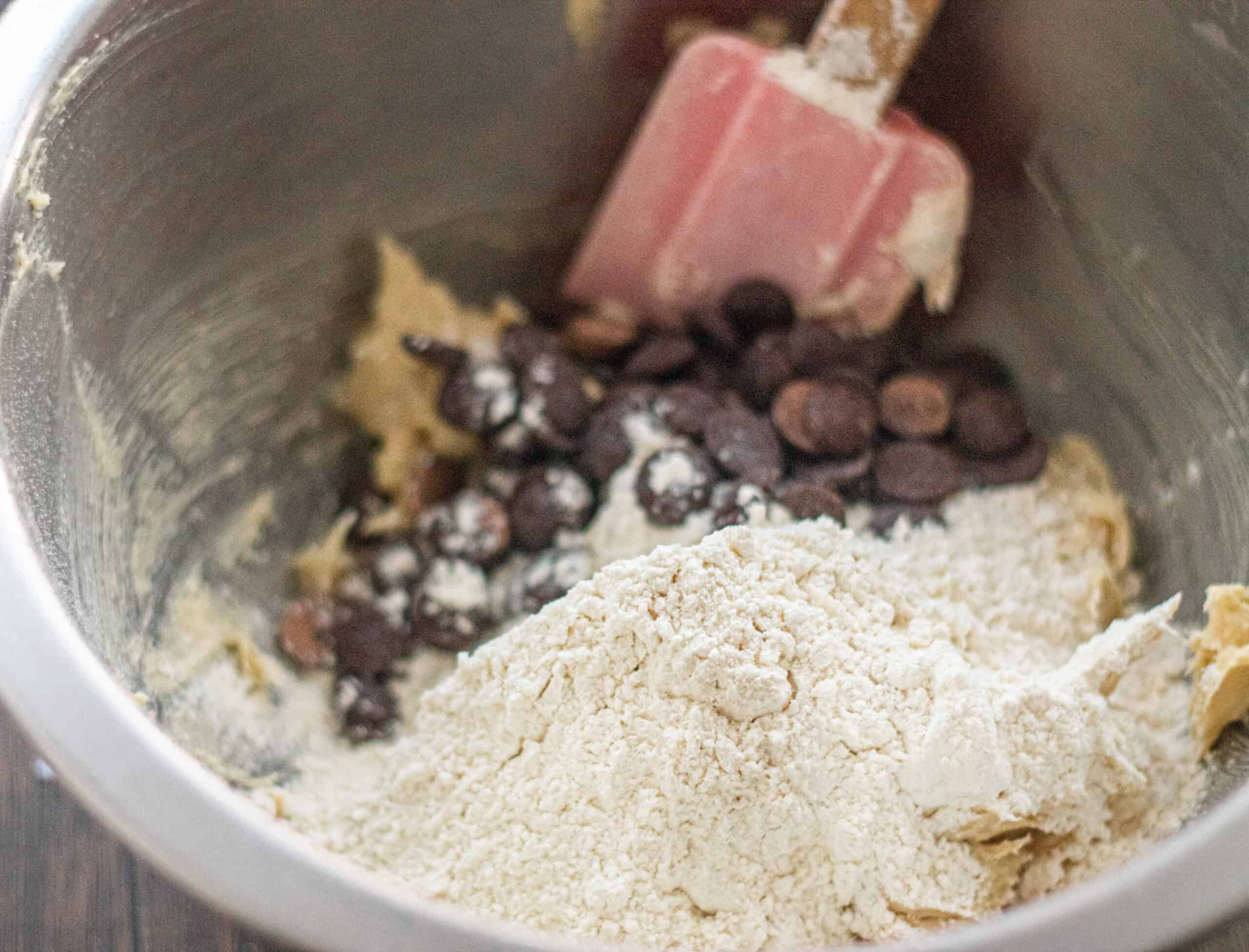 Folding flour into sourdough cookies