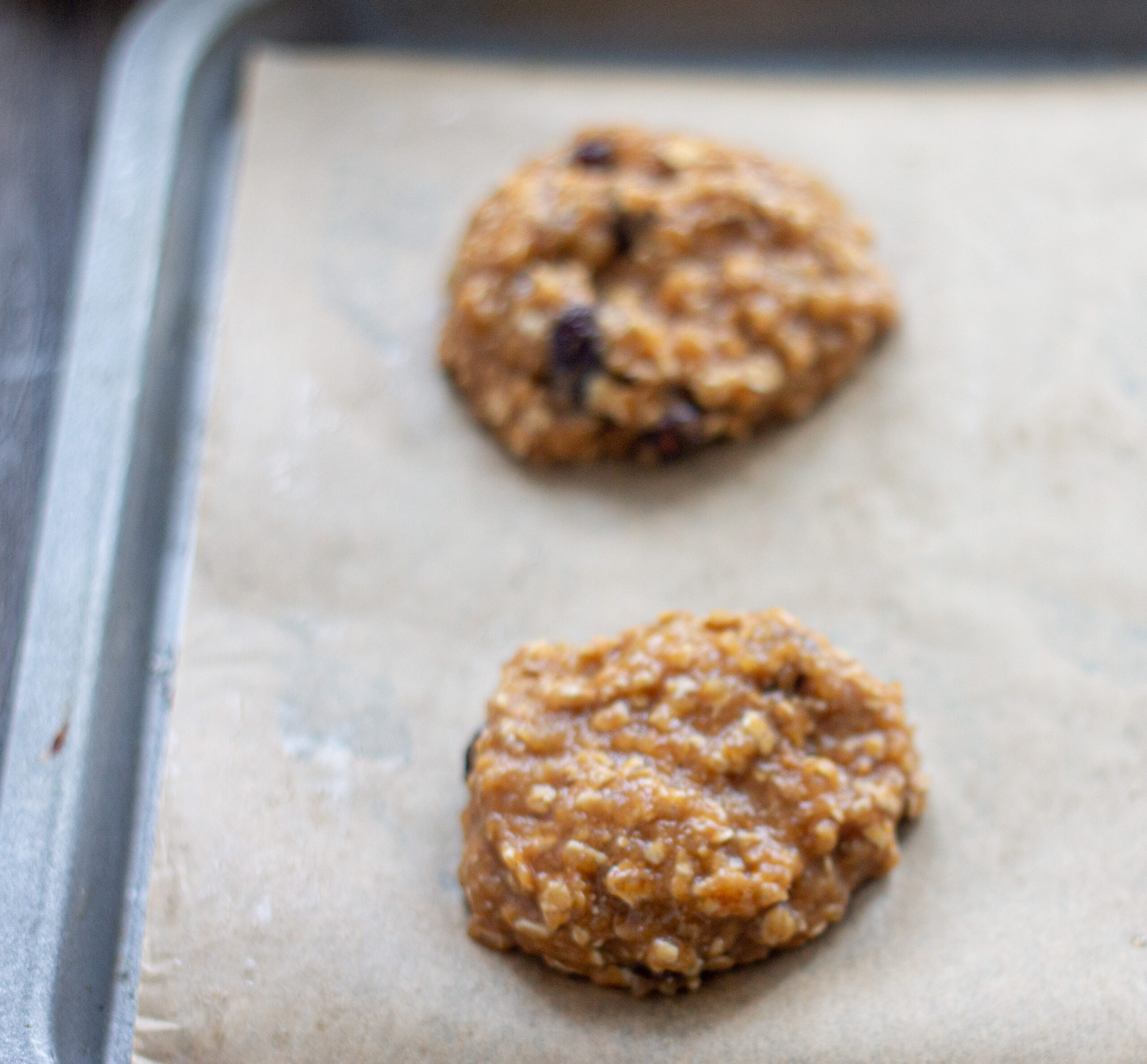 Flourless cookie dough on a baking sheet