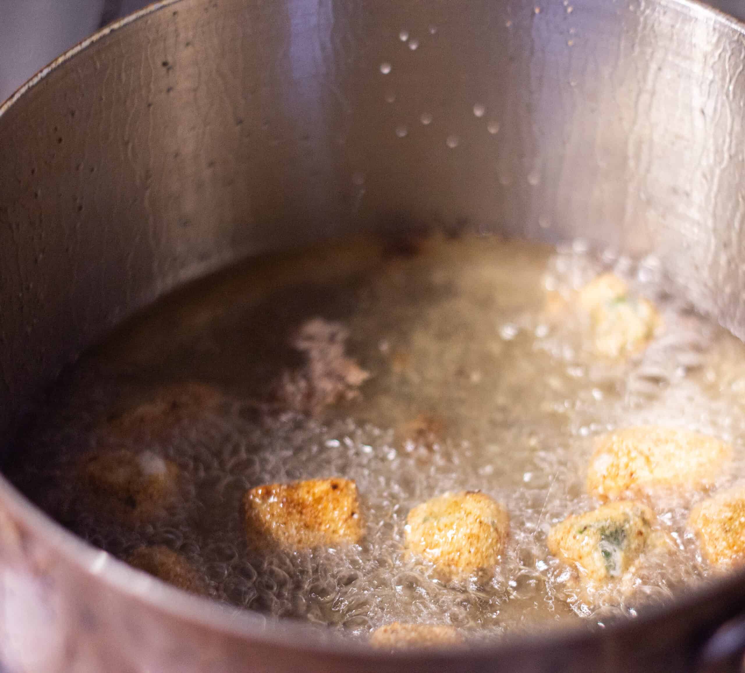 Frying cornmeal okra