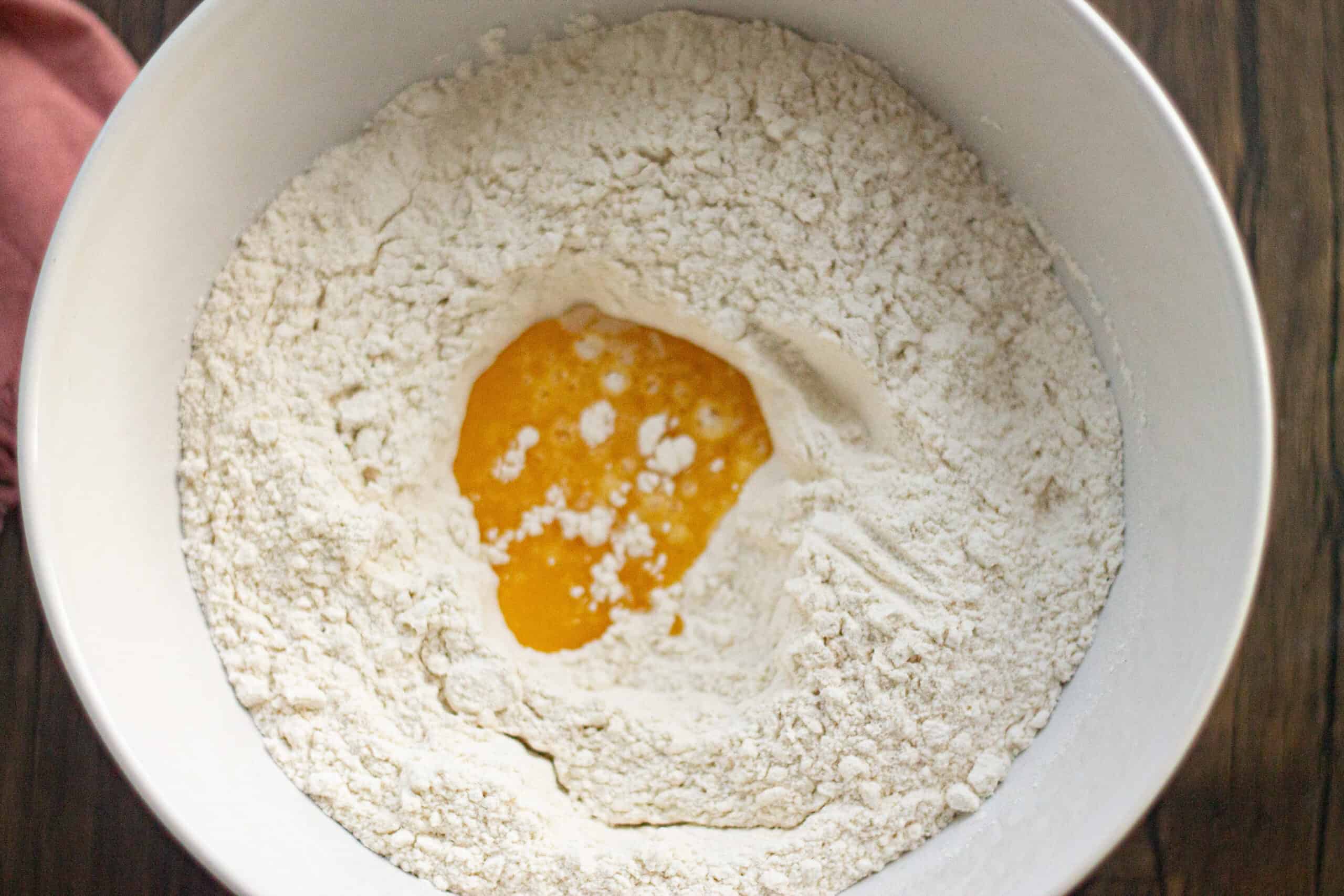Adding melted butter to flour