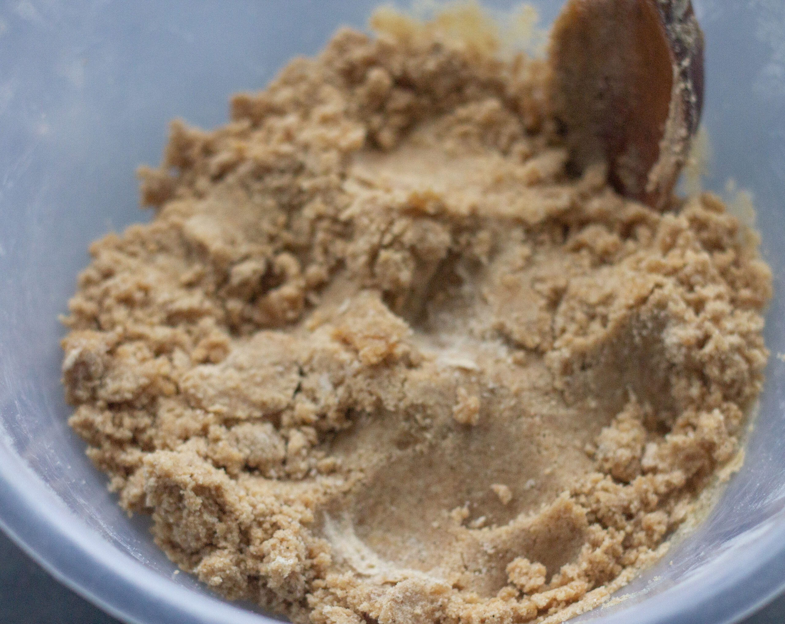 Mixing golden sryup into cookie dough