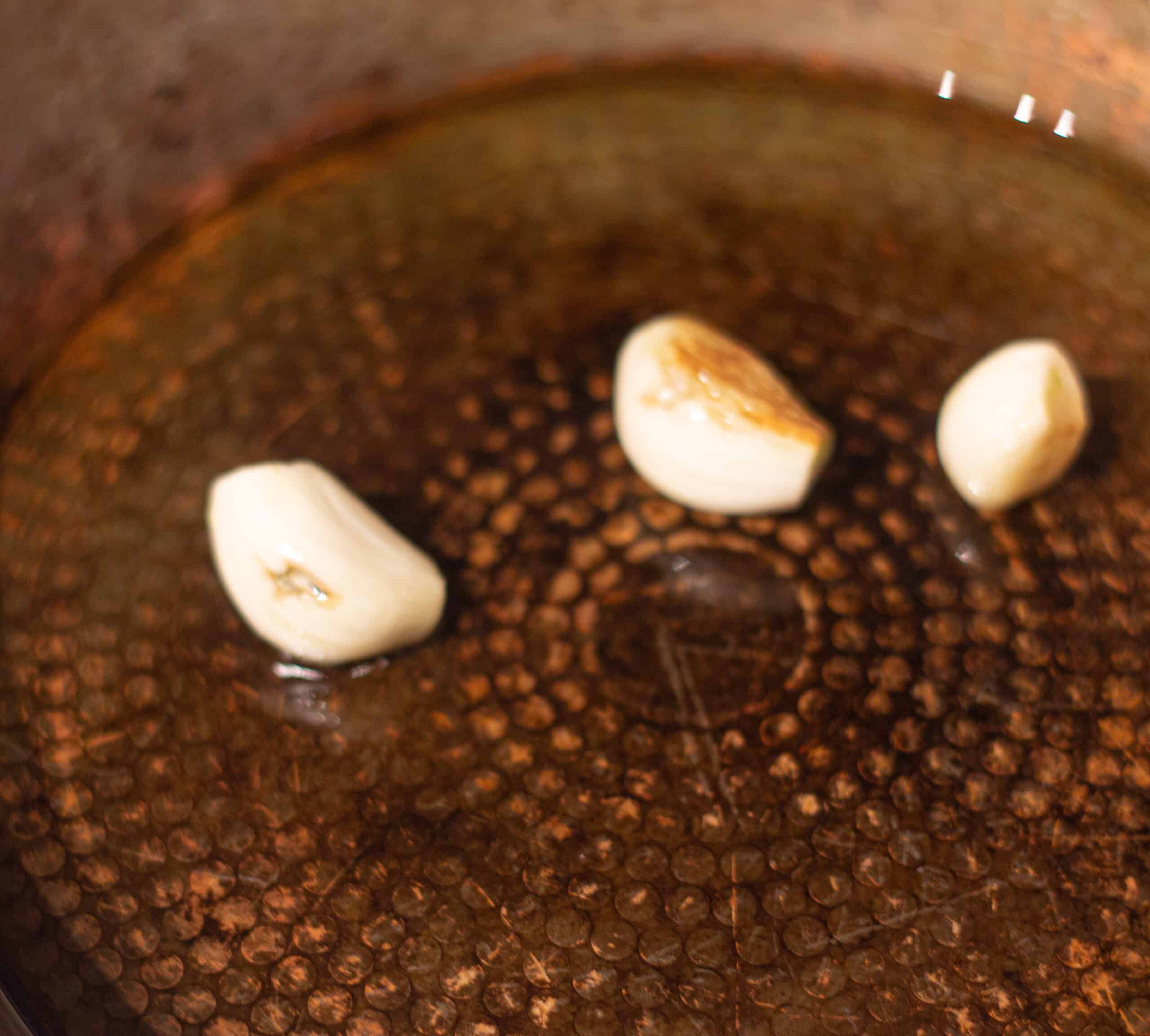 Garlic frying in olive oil