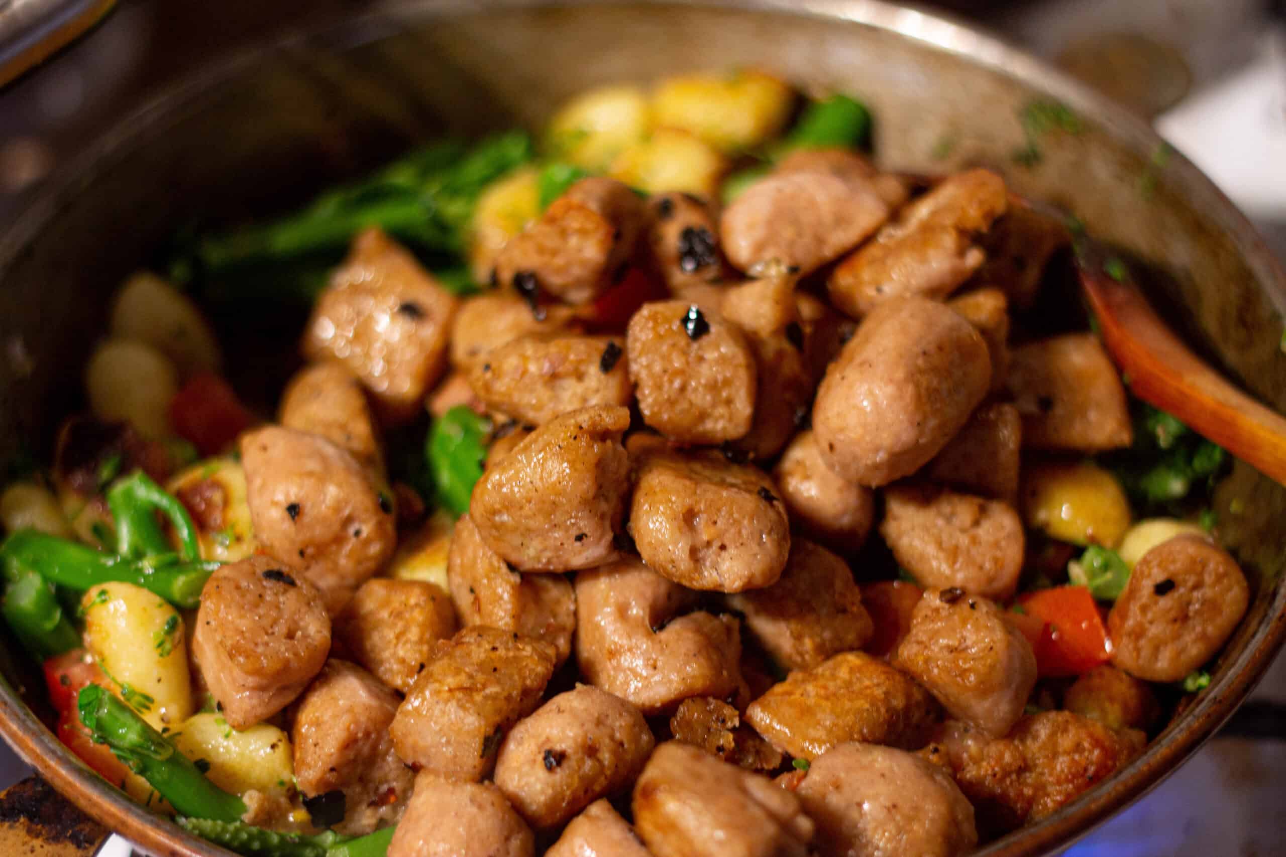 Adding sausage to the gnocchi