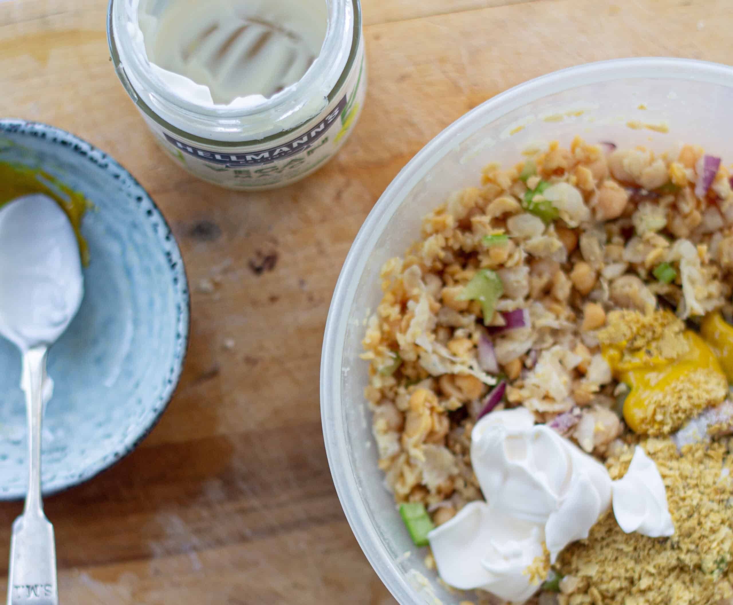 Stirring mayo in chickpea tuna