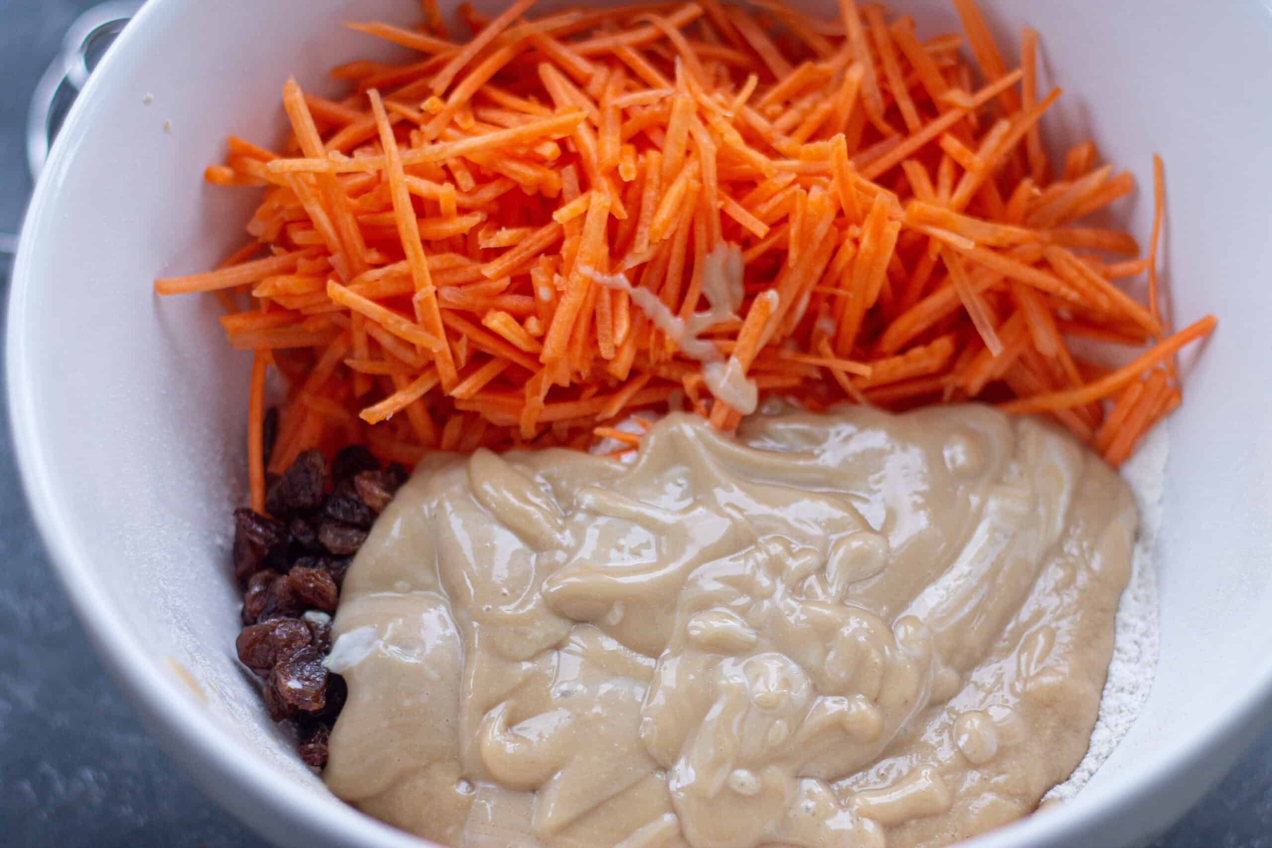 Mixing all the ingredients together for carrot cake