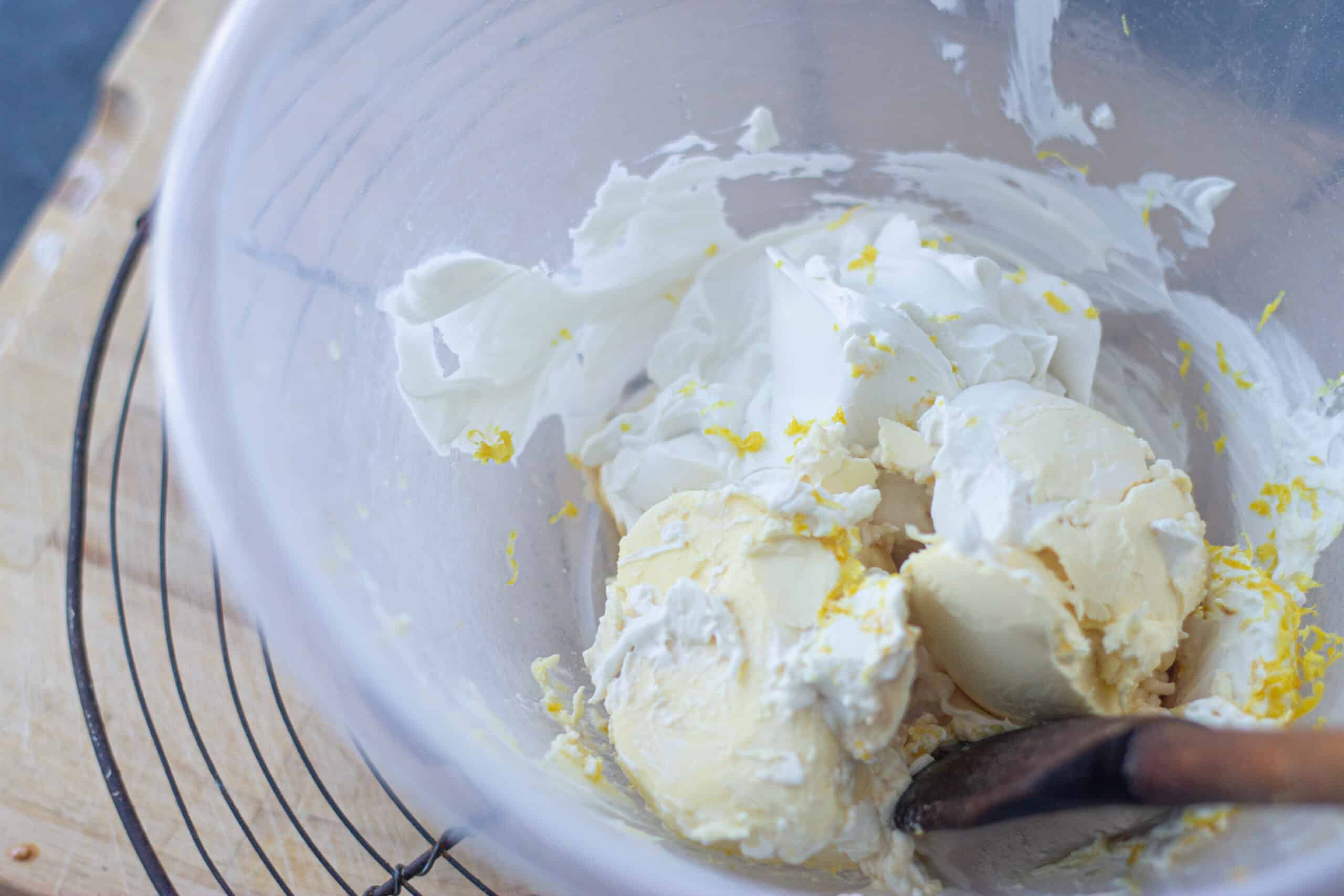 Butter and cream cheese in a mixing bowl