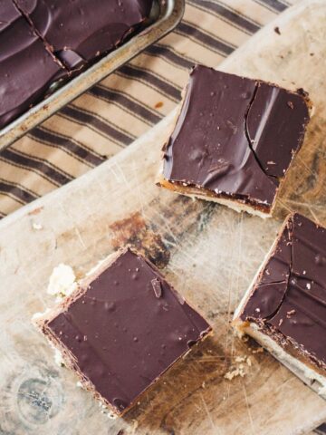 Millionaires Shortbread on a chopping board