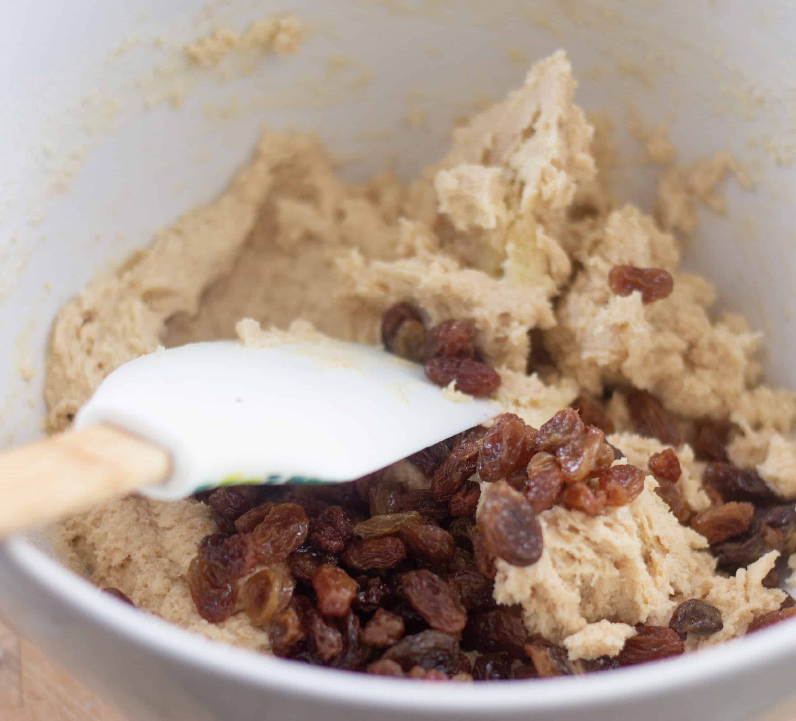 Adding sultanas to cake batter