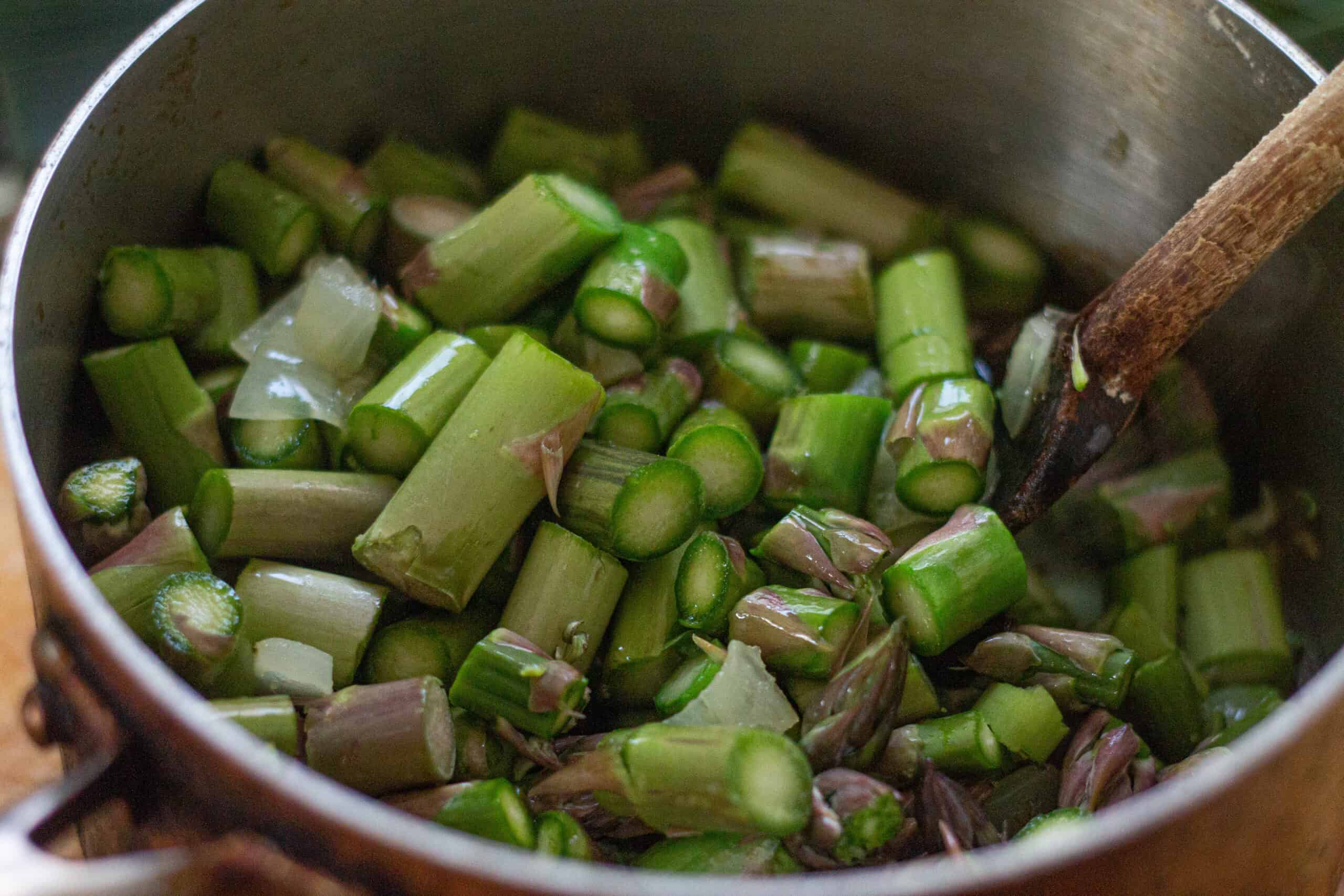 Adding asparagus to sauteed onion