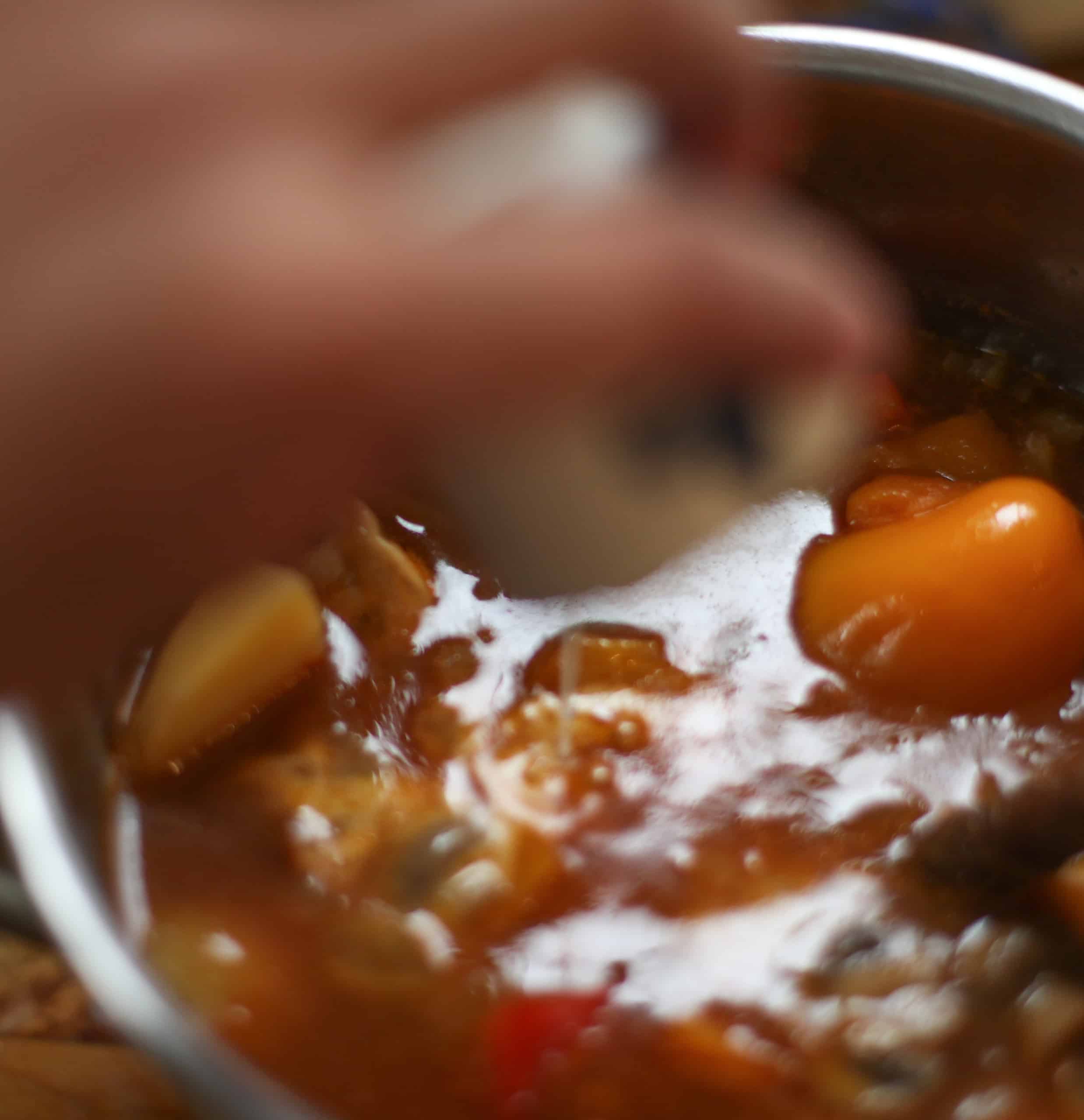 Stirring cornflour into goulash