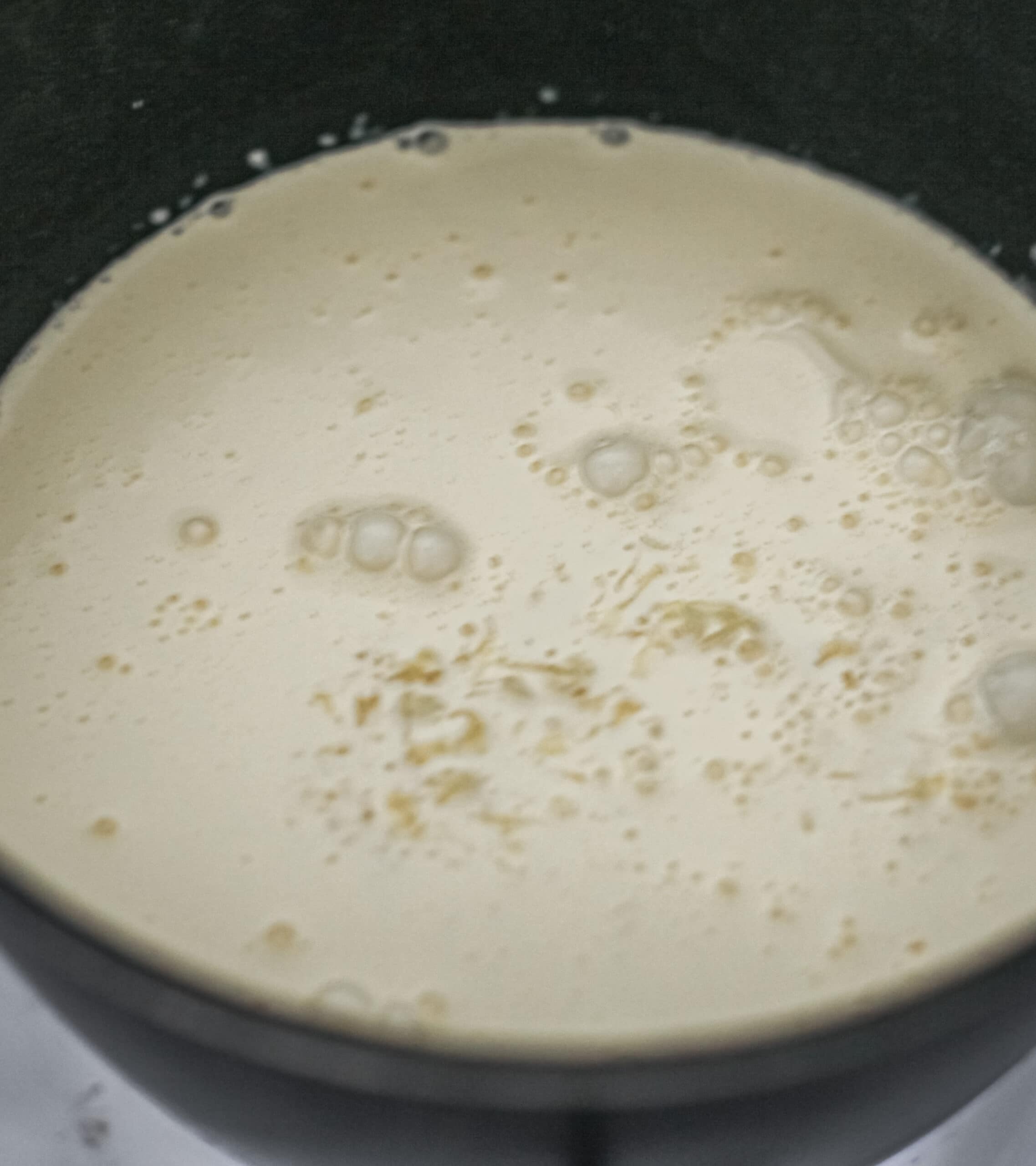 Simmering milk and cream for potato dauphinoise