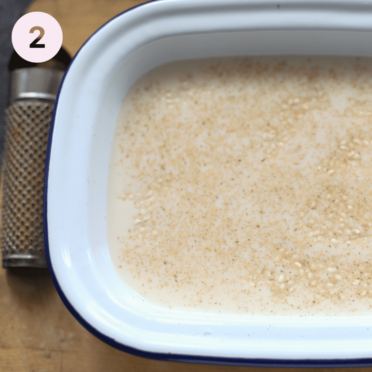 Adding milk to rice pudding.