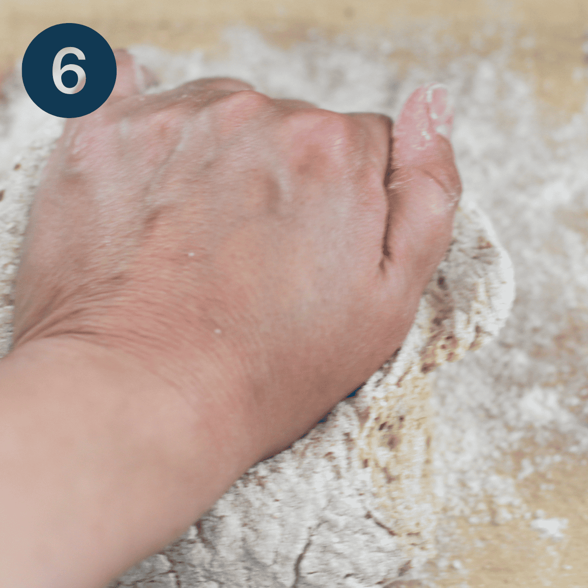 Kneading the oatmeal bread dough.